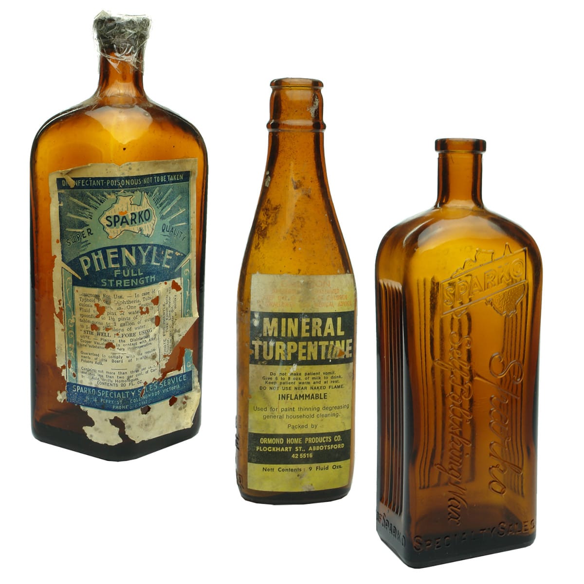 Three oil based product bottles, 2 with labels: Sparko Phenyle; Ormond Products, Turpentine; Sparko Polishing Wax.