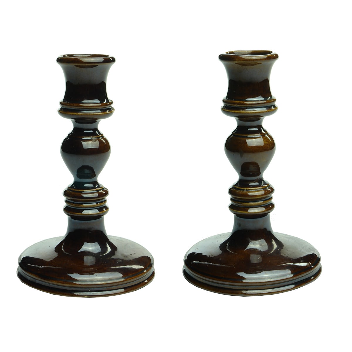 Candlesticks. Pair of Rockingham style glaze candle sticks.