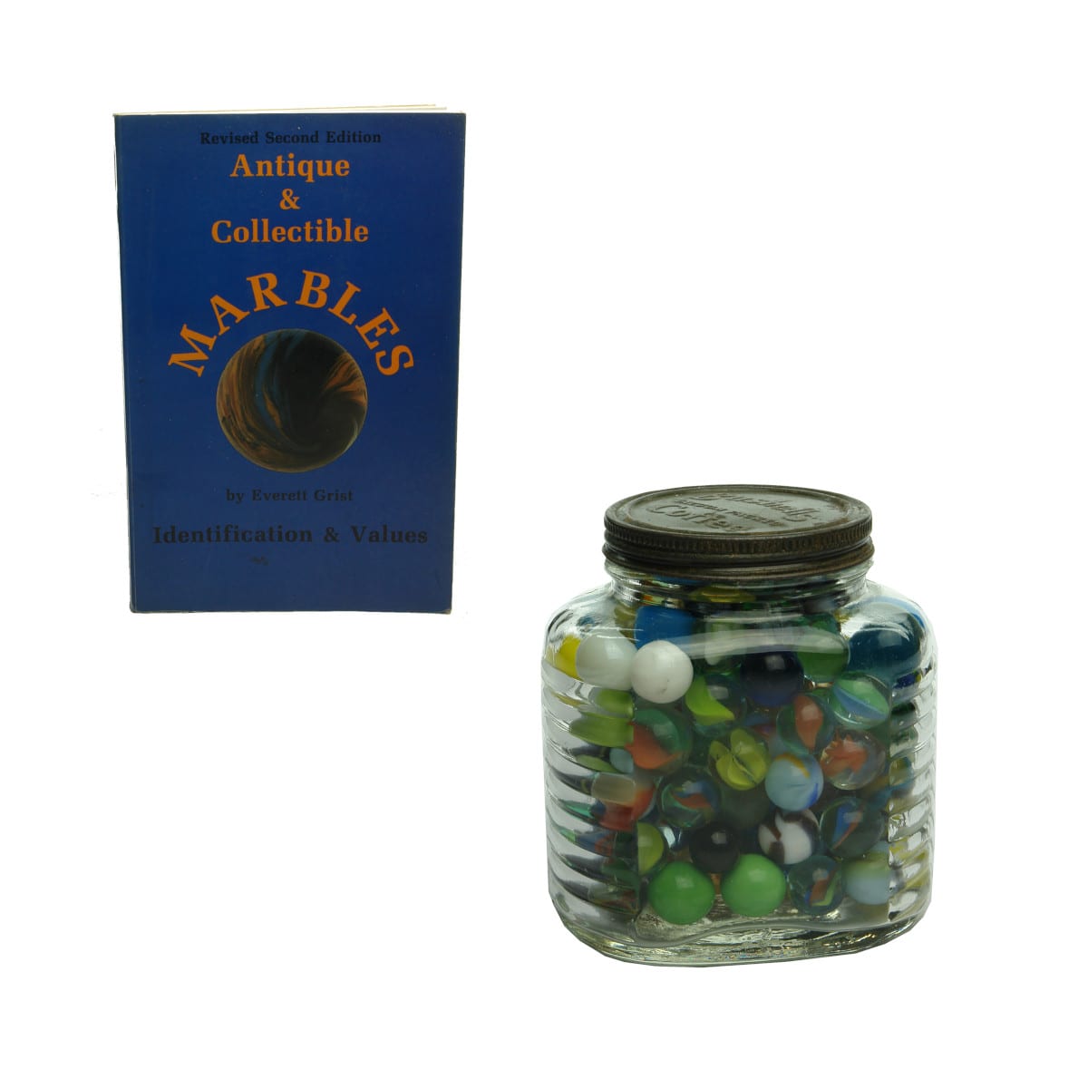 Miscellaneous. Bushell's Coffee Jar full of marbles plus a book on Antique & Collectible Marbles.