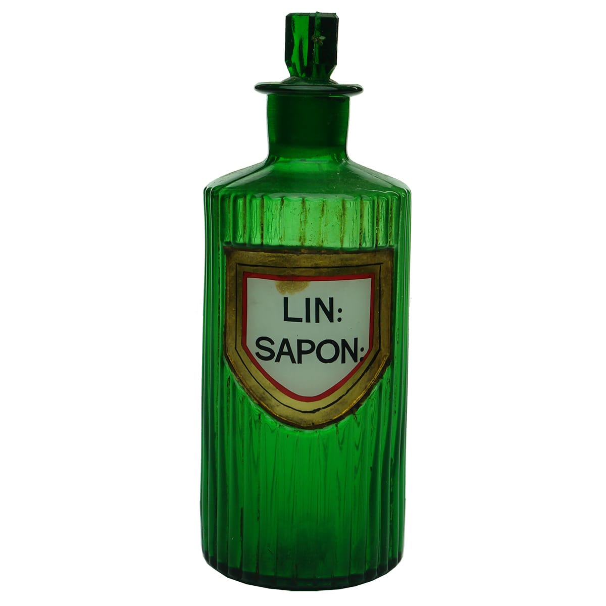 Pharmacy. Lin: Sapon: Green. Ribbed. Label under glass. 12 oz.