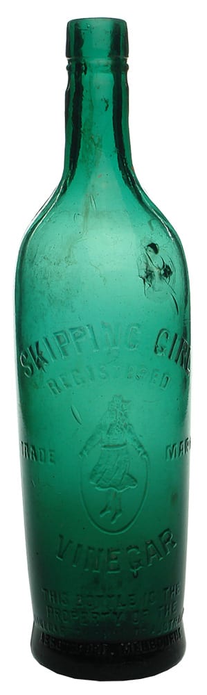 Green Glass Skipping Girl Vinegar Bottle