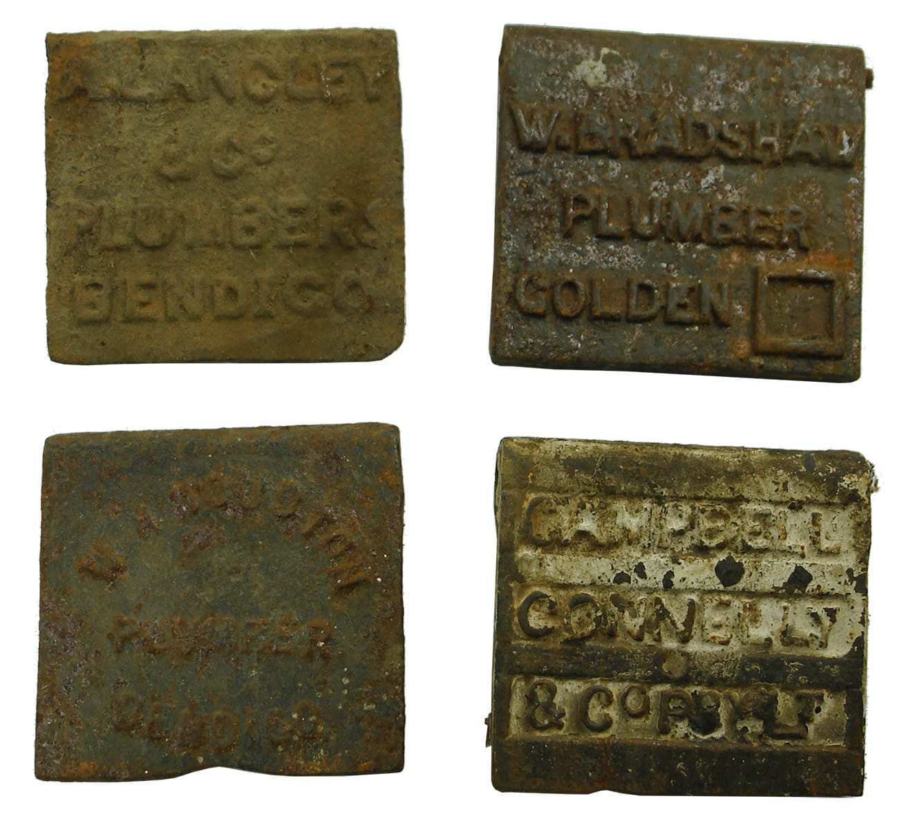 Four small Bendigo Cast Iron Plumbers Covers