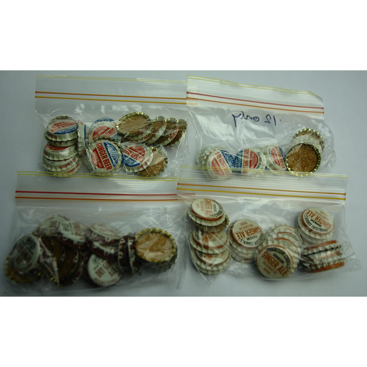 Four bags of unused Crown Seal Caps from Gunnedah Cordial Works, GUN Soft Drink & Progressive Cordials. (New South Wales)