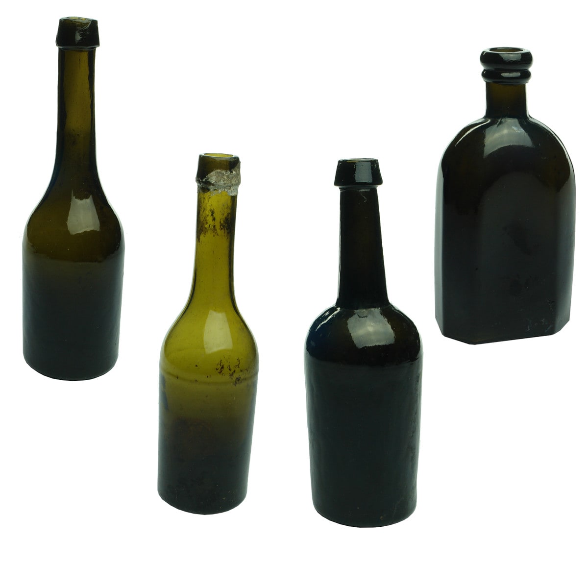 Four plain black glass bottles. 2 Cod Liver Oils; 3 piece mould and chamfered oblong.