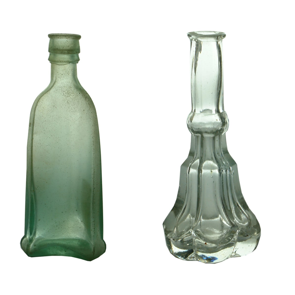Pair of Goldfields era Bottles: 1. Sauce. Triangular with chamfered edges. Round pontil scar. 2. Fancy facetted Crosse & Blackwell type. Clear Flint glass.