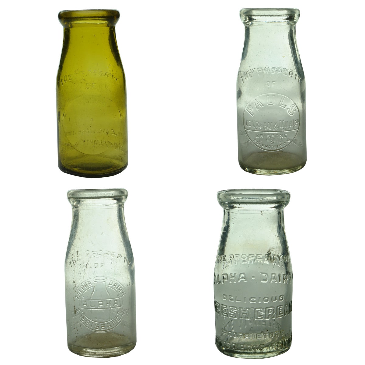 Four small Queensland Milk/Cream Bottles: Plain Amber; Pauls Brisbane & Rockhampton; Alpha Dairy; Pommer Bros. Ipswich. (Queensland)