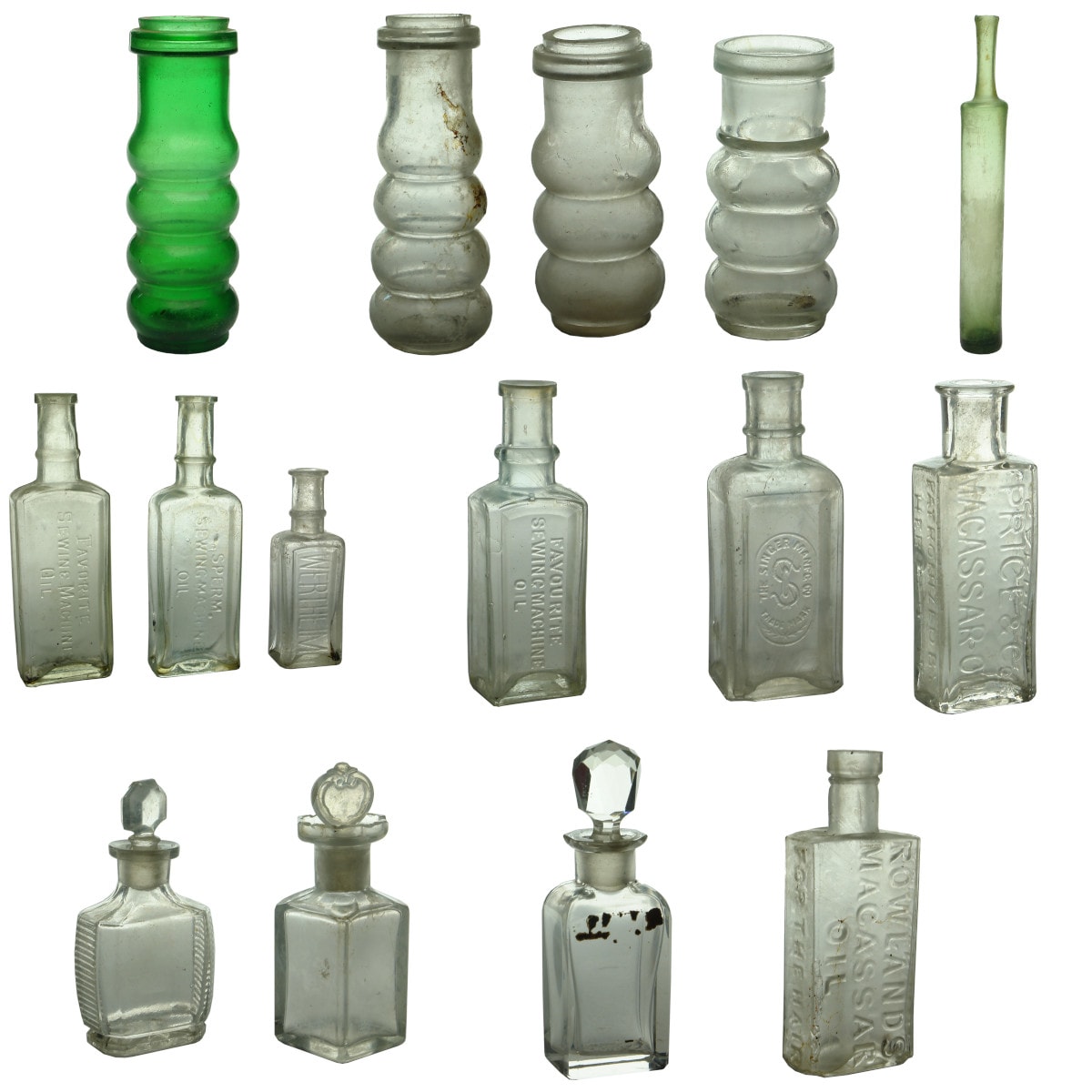 15 small bottles: Condiment Jars; 5 Sewing Machine Oils; Lavender Water; Three Moulded Glass Perfumes; 2 Hair Oils.