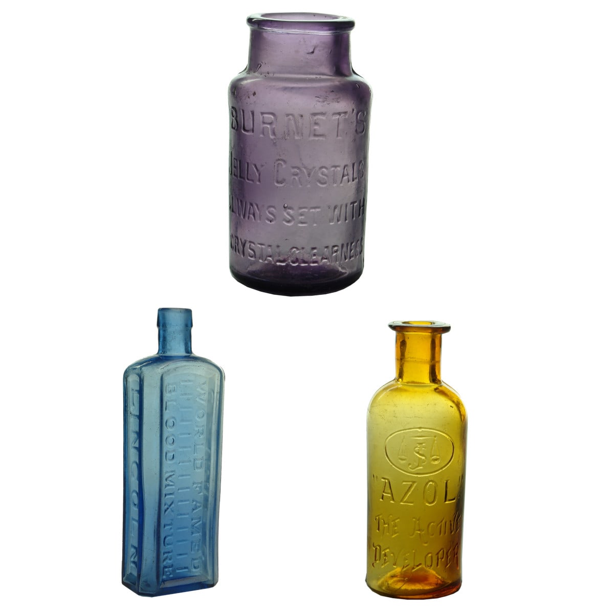 Three great coloured bottles: Clarke's Blood Mixture; Burnet's Jelly Crystals Jar; Azol Developer.