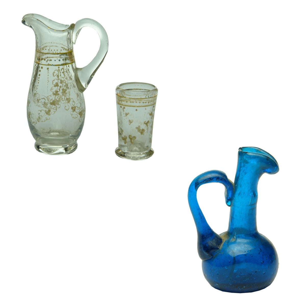 3 Miniature Items: Miniature glass Jug and Beaker. Pontil scars. Mini Persian style blue jug.