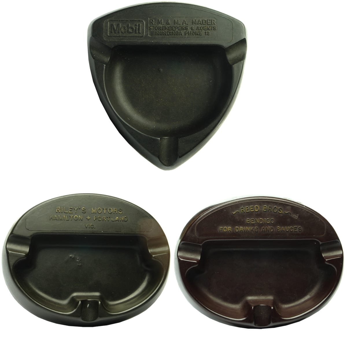 3 Bakelite Ashtrays. Riley's Motors Hamilton & Portland. Reed Bros Bendigo. Mobil. Mader, Storekeepers & Agents, Murdinga.