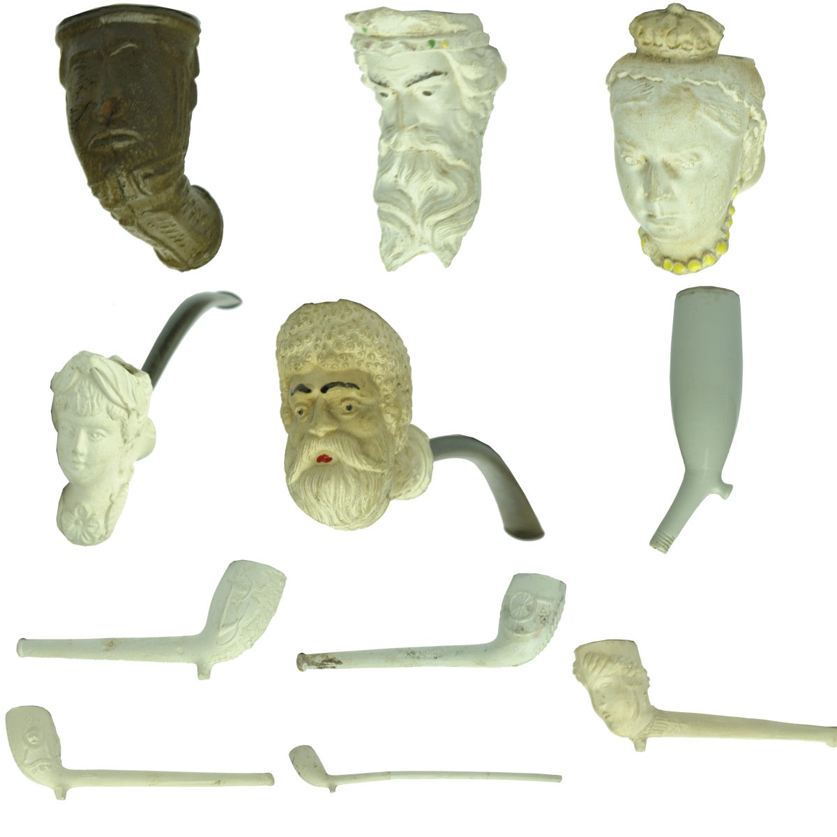 11 Clay Pipes. Mostly figural with some interesting shapes and designs.