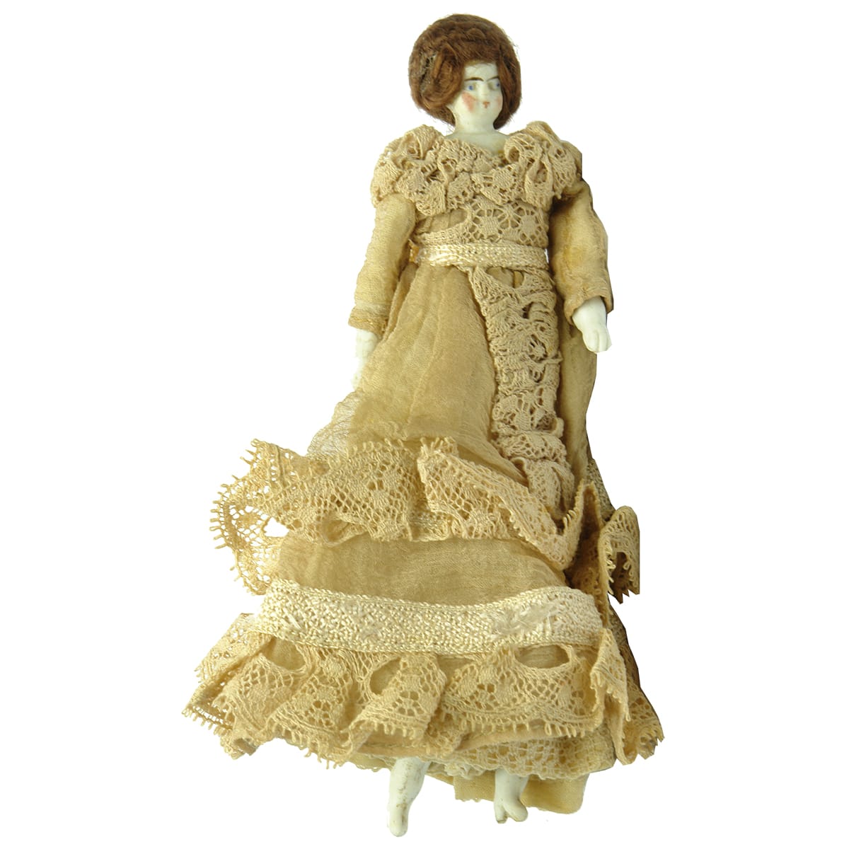 Doll. Original doll with arms and legs and early lace dress.