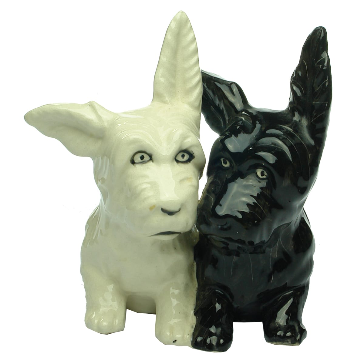 Ceramic Scotty Dogs with long ears? Made in Japan.