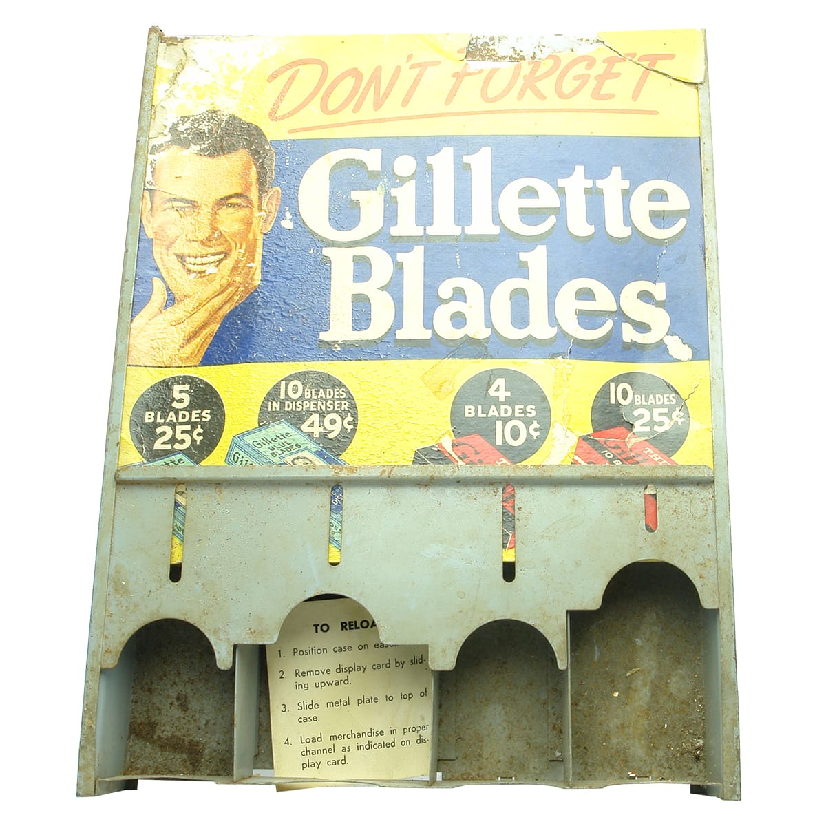 Gillette Razor Blades dispenser. Cardboard advertising on metal stand.