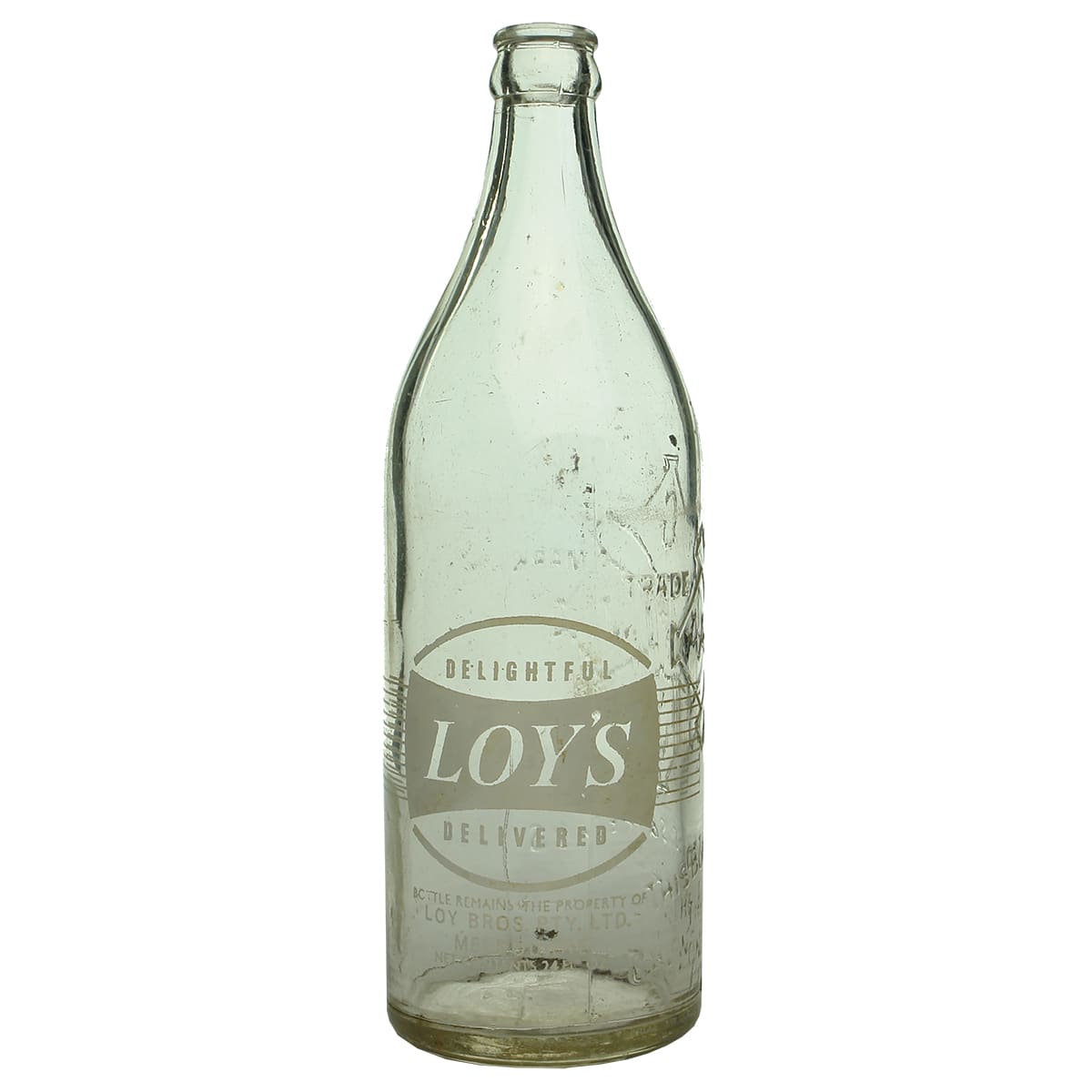 Crown Seal. Loy's Ceramic Label on a Geelong Aerated Waters embossed bottle. Clear. White print. 24 oz. (Victoria)