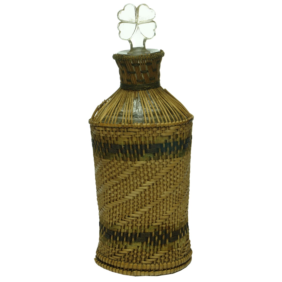 Perfume. Fine wicker cover to glass bottle. Original Four leaf clover stopper.