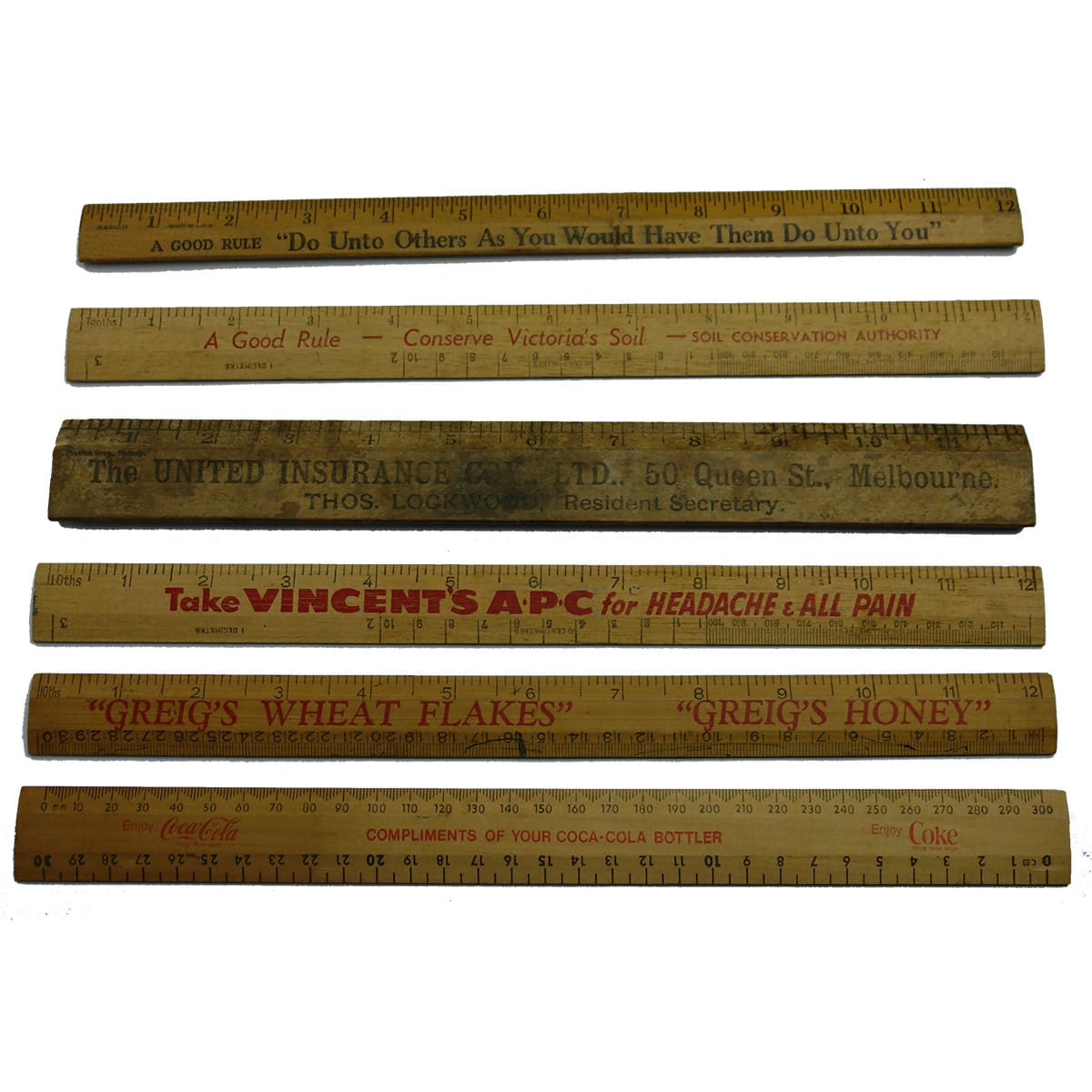 Six Advertising Rulers: 2 x Coca Cola; Greig's Honey; Vincents APC; United Insurance; Soil Conservation Authority.