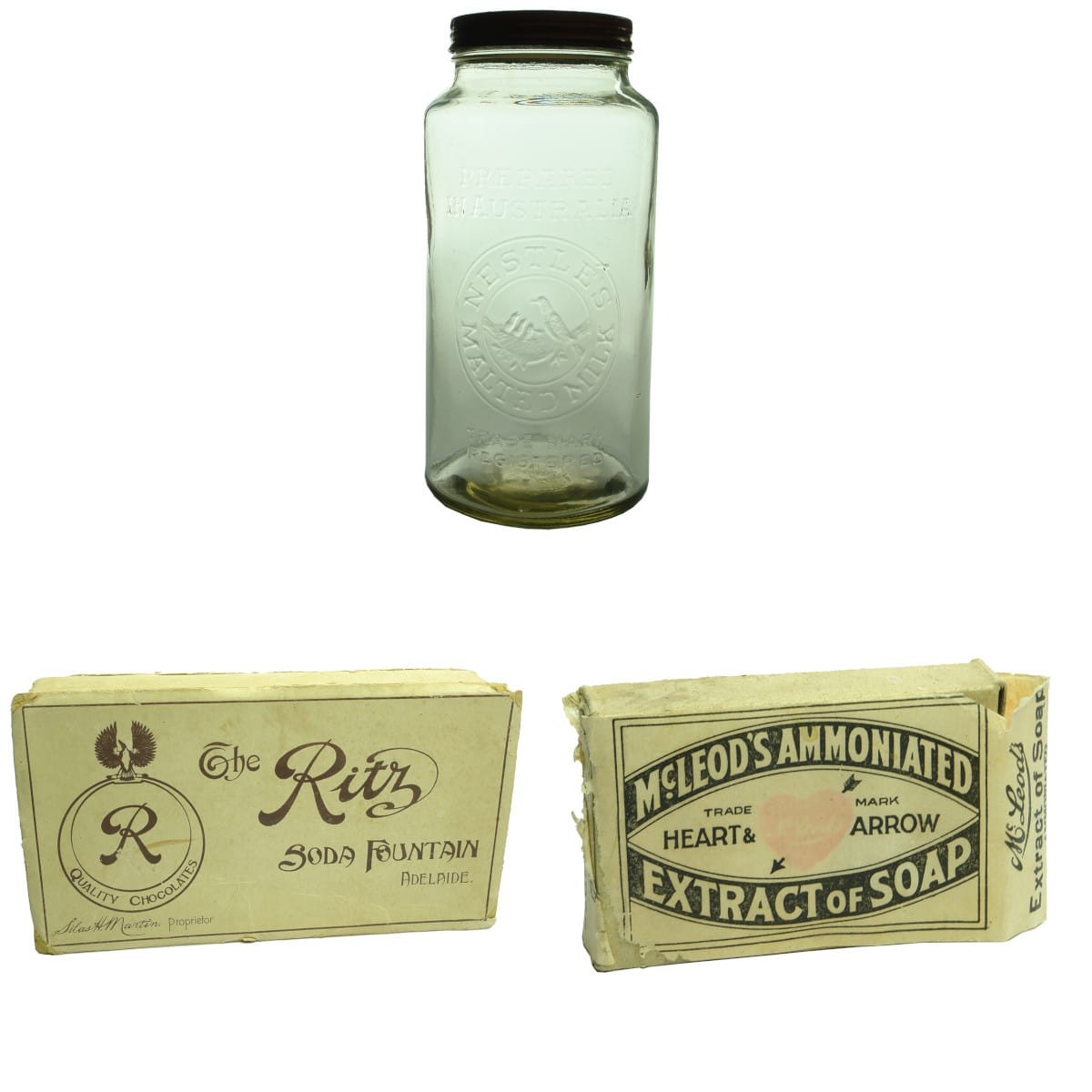 3 items. Large Nestles Jar and 2 lots of packaging: Ritz Soda Fountain Adelaide and McLeod's Ammoniated Soap.