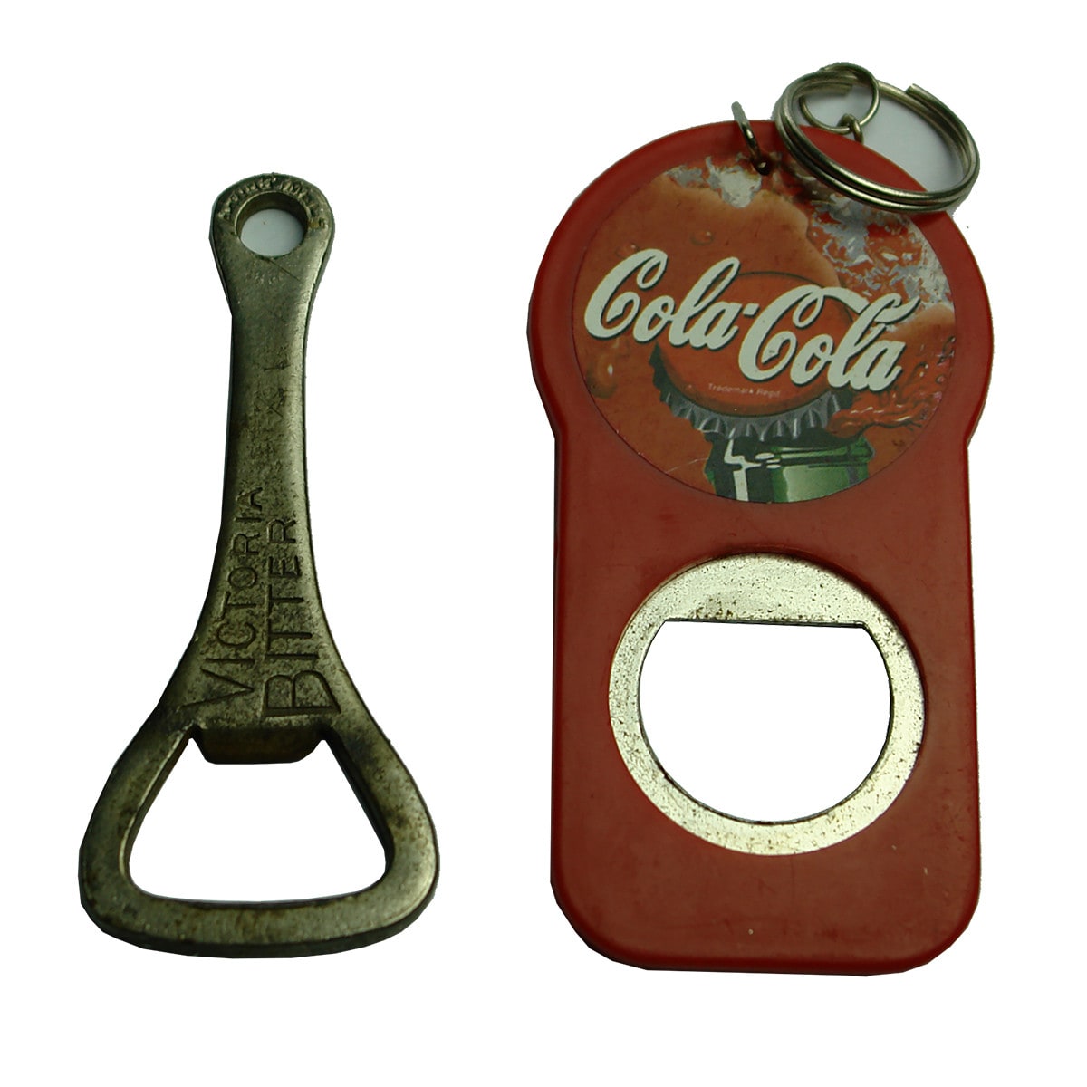 Two crown seal bottle openers: Victoria Bitter and Coca Cola.