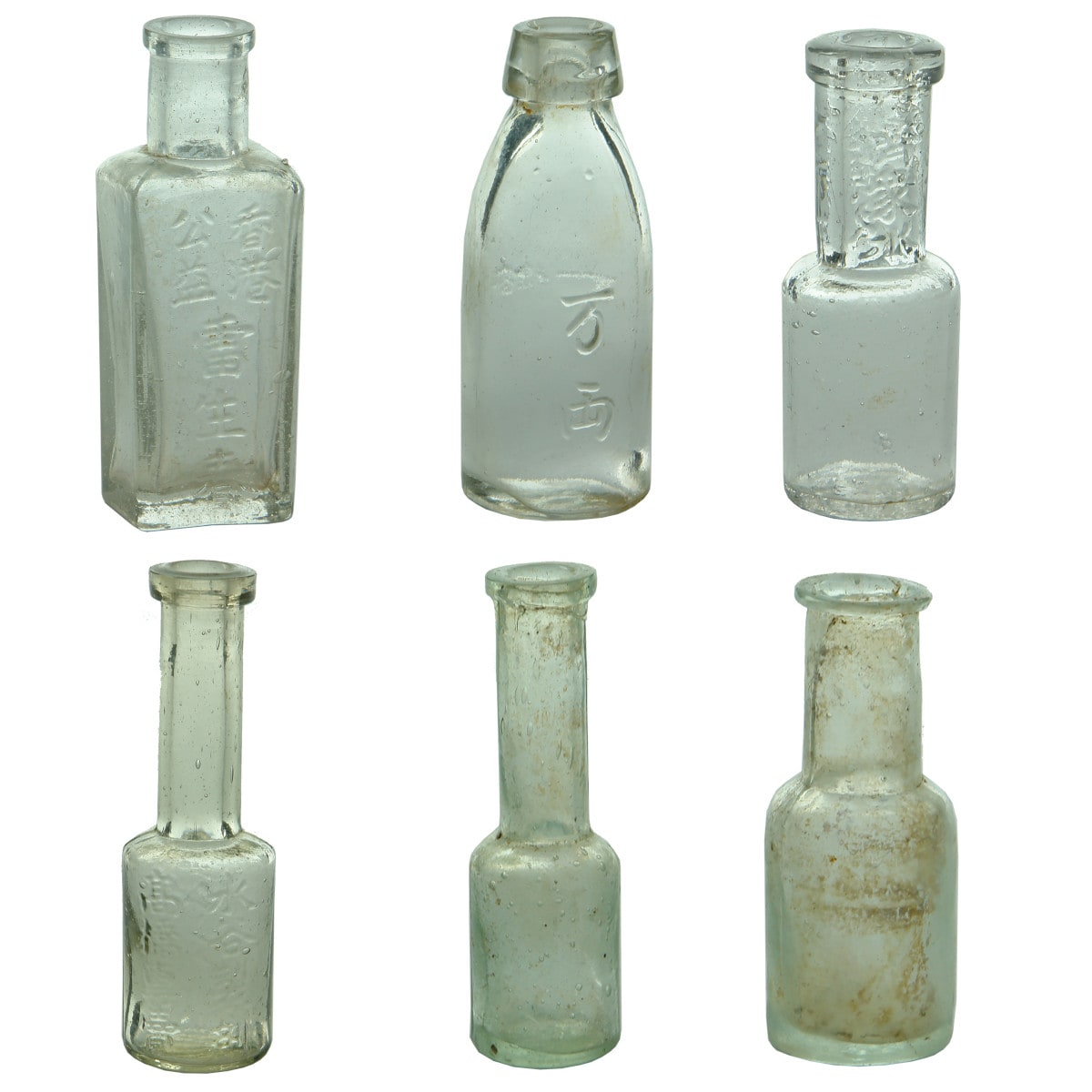Six small Chinese/Japanese glass bottles.
