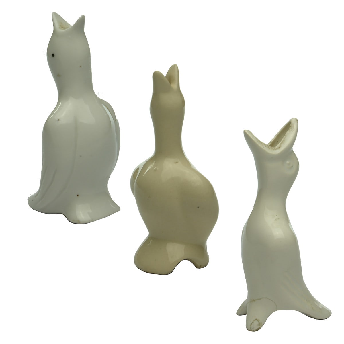 Three figural bird pie funnels: 1. Black Dot eyes; 2. Cream coloured, wide shoulders; 3. Scarily wide mouth!