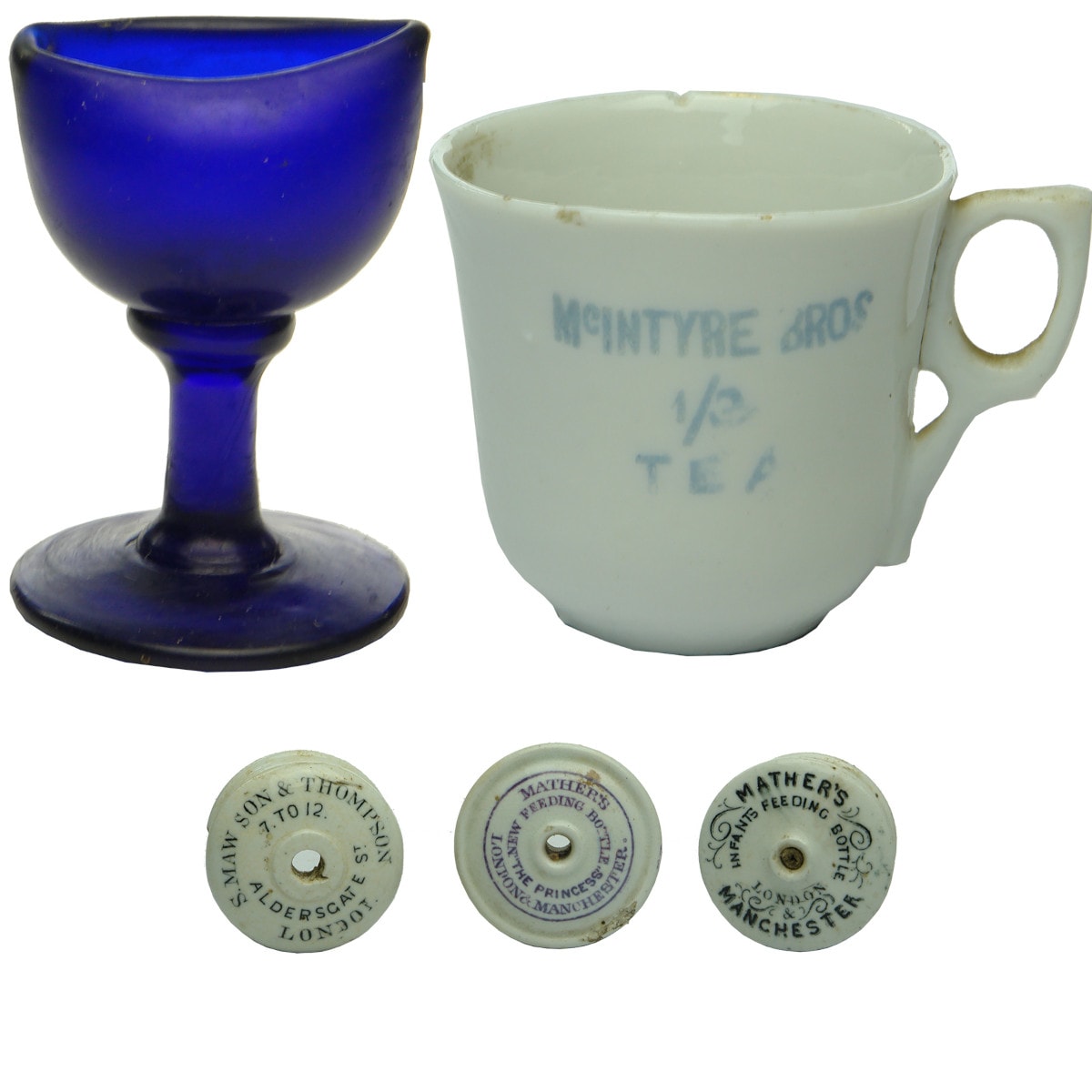 Five small items: Cobalt Blue Eye bath; McIntyre tea advertising Dolls Cup; 3 Baby Feeder tops.