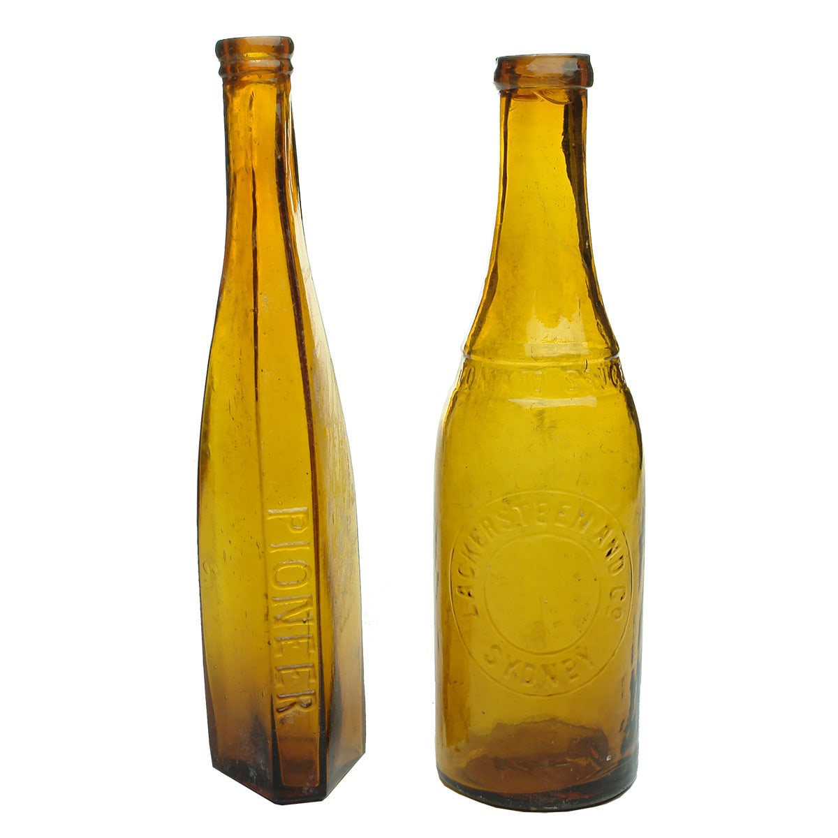 Pair of Light Amber Bottles: Hexagonal Pioneer oil and Lackersteen and Co, Sydney Tomato Sauce.