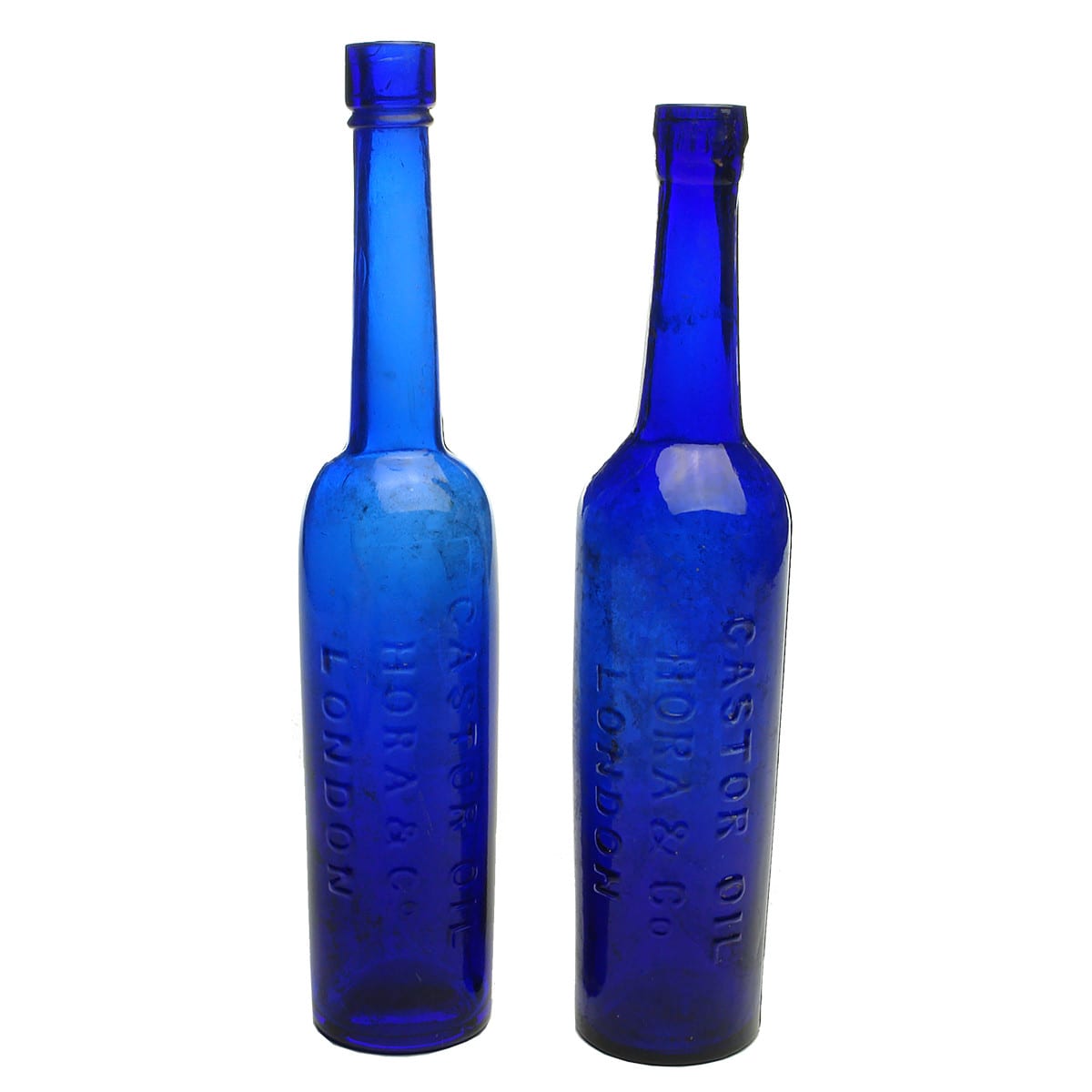 Pair of Hora & Co., London Castor Oils. Cobalt Blue. 5 oz.