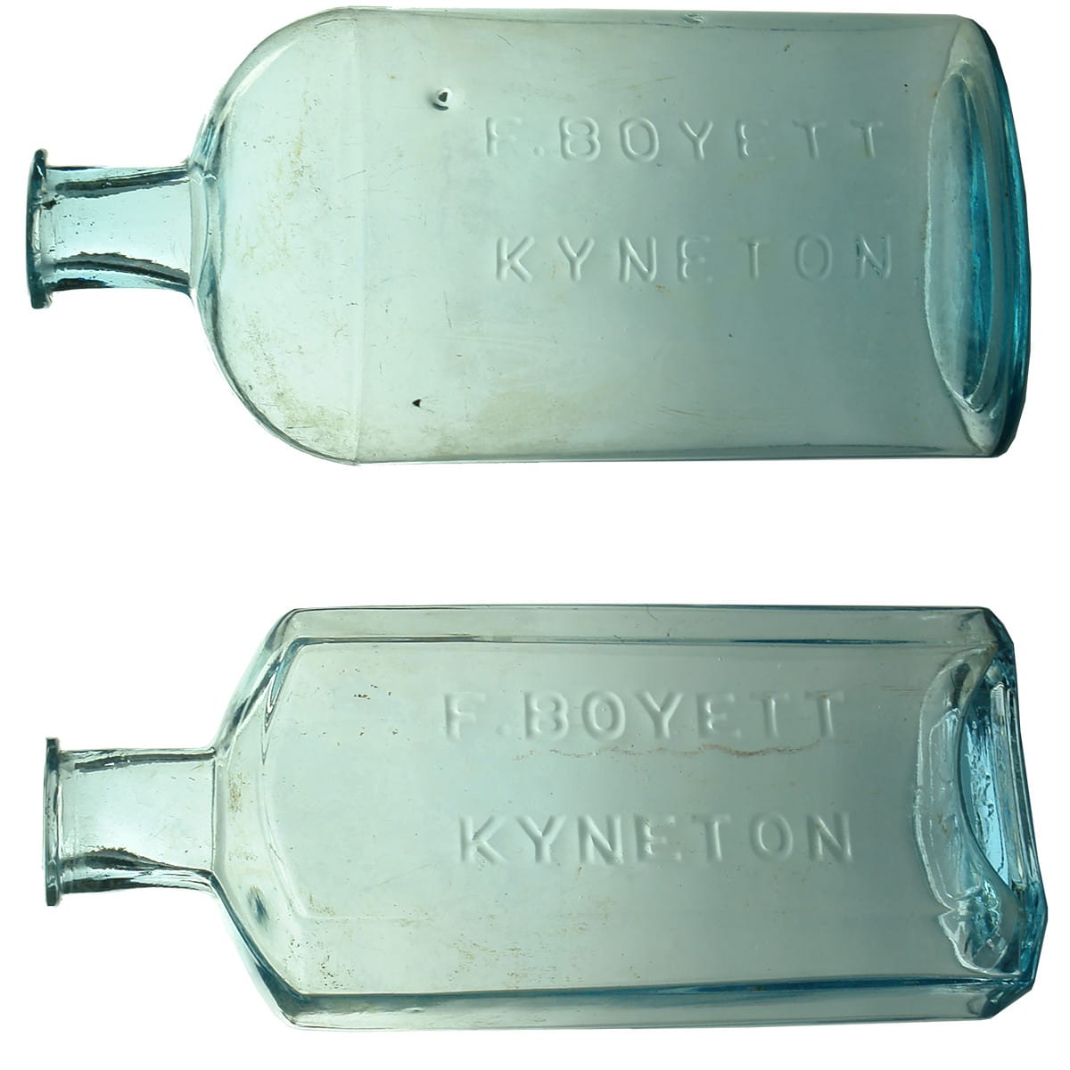 Pair of Chemist bottles from F. Boyett, Kyneton. Oval & Oblong. Ice Blue. (Victoria)
