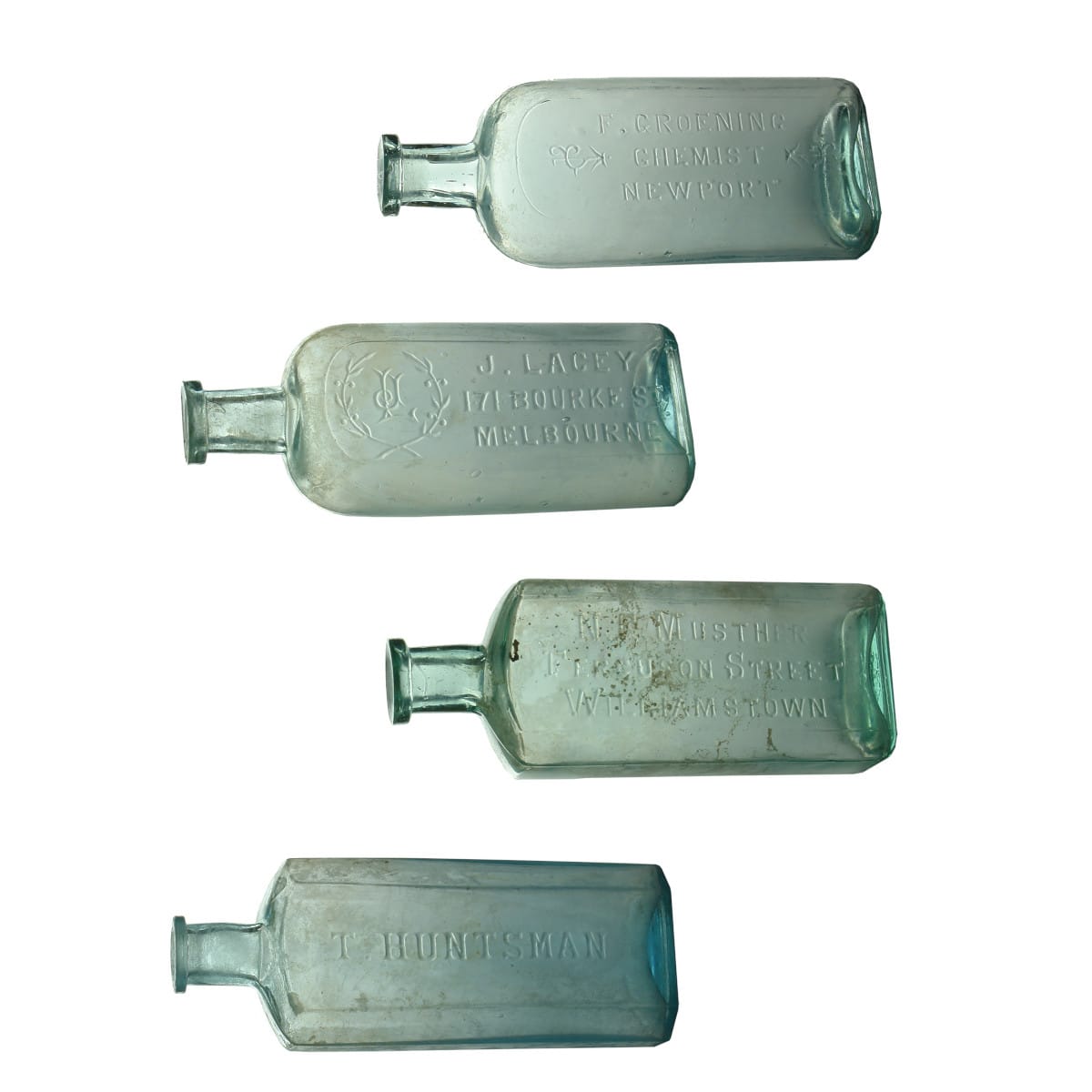 Four suburban Melbourne Chemist Bottles: Huntsman; Musther, Williamstown; Lacey, Melbourne and Groening, Newport. (Victoria)