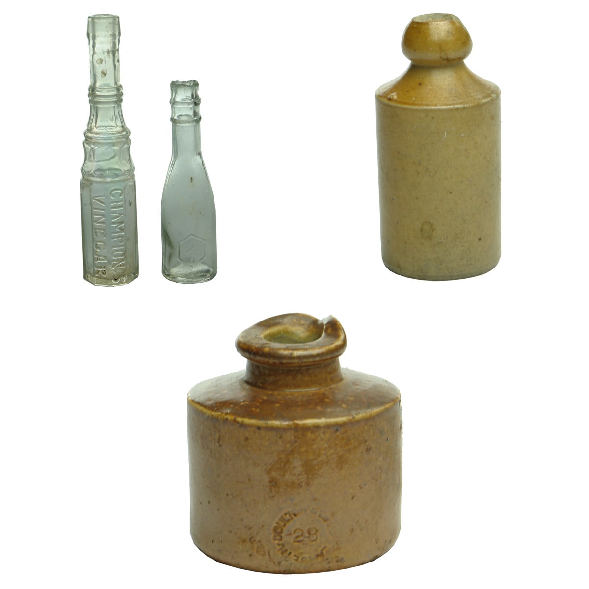 4 Bottles 3 Miniatures and an Ink. Clear Champion's Vinegar; small bottle with hexagon; Doulton Ginger Beer; Doulton Penny Ink with pourer..