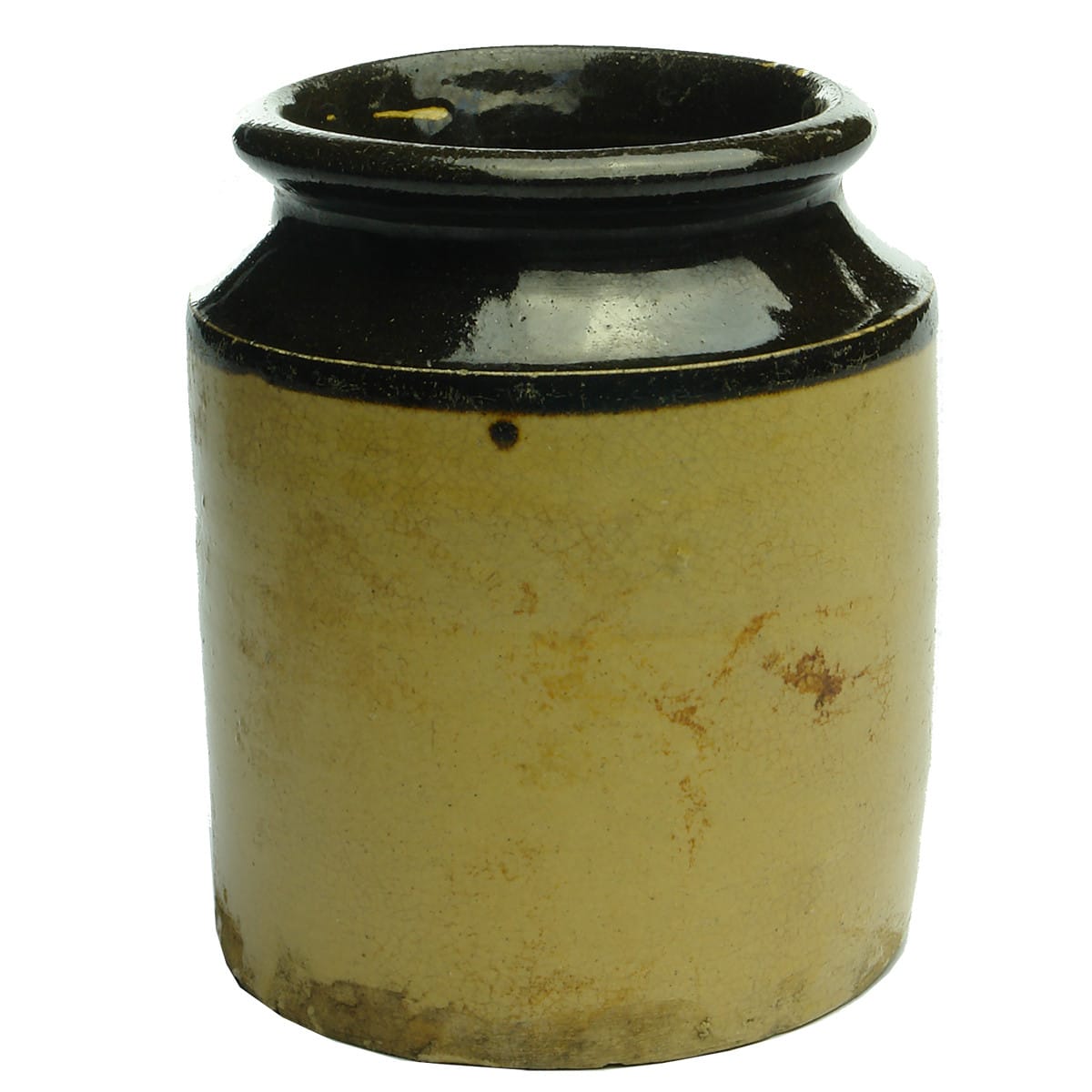Early earthenware jar. Yellow coloured with dark chocolate top.
