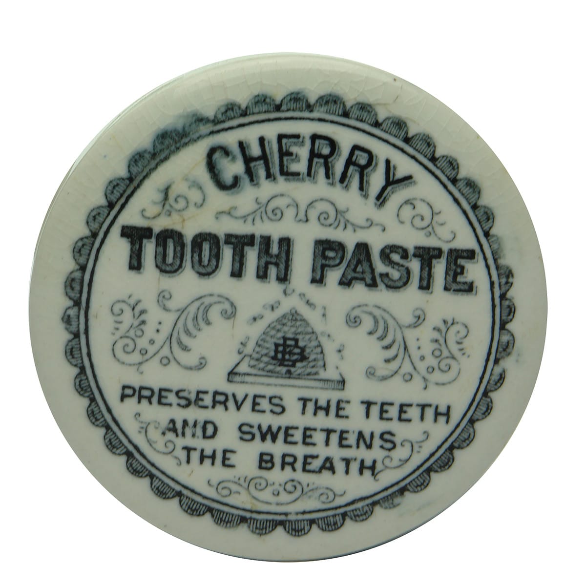 Pot Lid. Cherry Tooth Paste. Beehive with EB Monogram. (Elliott Bros., Brisbane, Queensland)