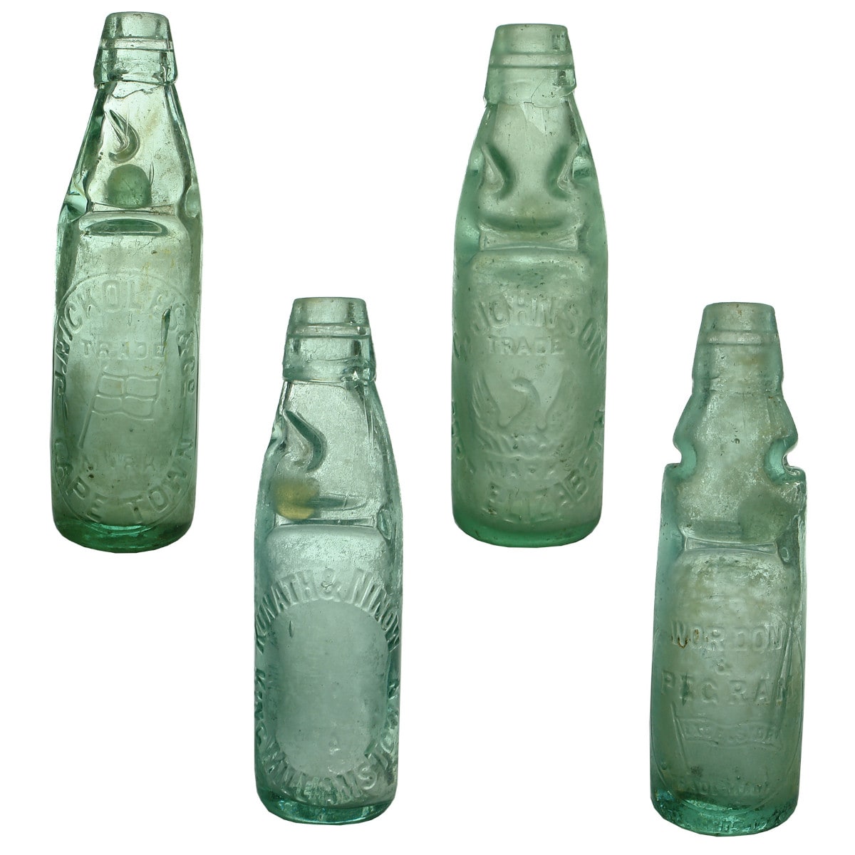 Four South African Marble Bottles: Nickoles & Co., Cape Town; Kunath & Ninow, King Williams Town; Johnson, Port Elizabeth; Wordon & Pegram, Rondebosch. (South Africa)