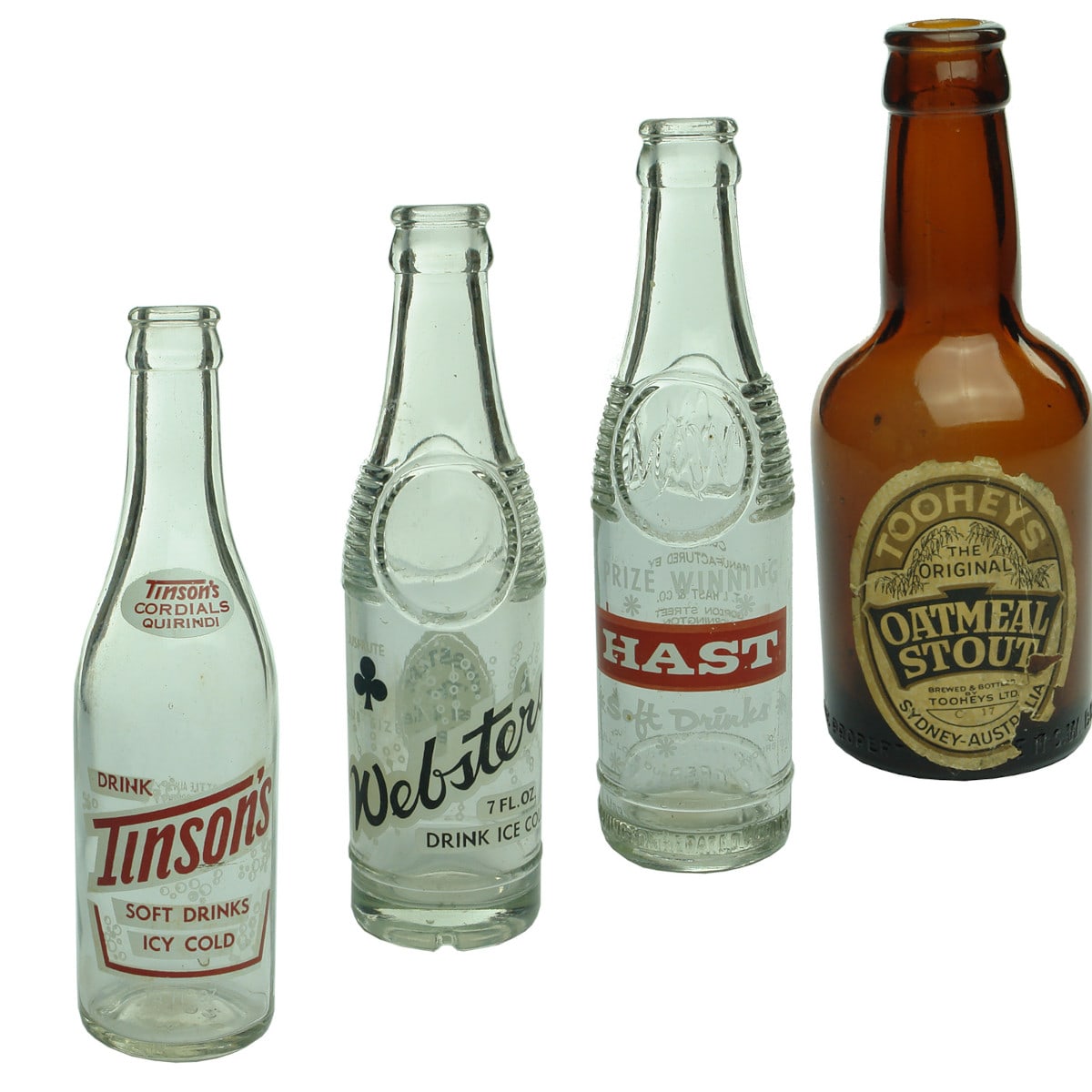 4 bottles. 3 x Ceramic Label Crown Seals & labelled beer: Tinson's Quirindi 10 oz; Websters Jusfrute 7 oz; Hast & Co., Mornington; Tooheys Oatmeal stout 4 oz. (New South Wales & Victoria)