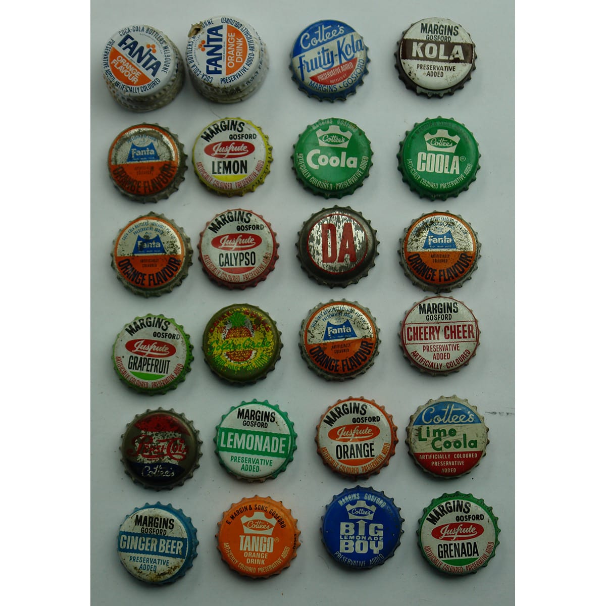 24 Soft Drink Caps: 2 x Screw top Fanta; Crown Seals are mostly Margin's Gosford and Cottees with a few others.