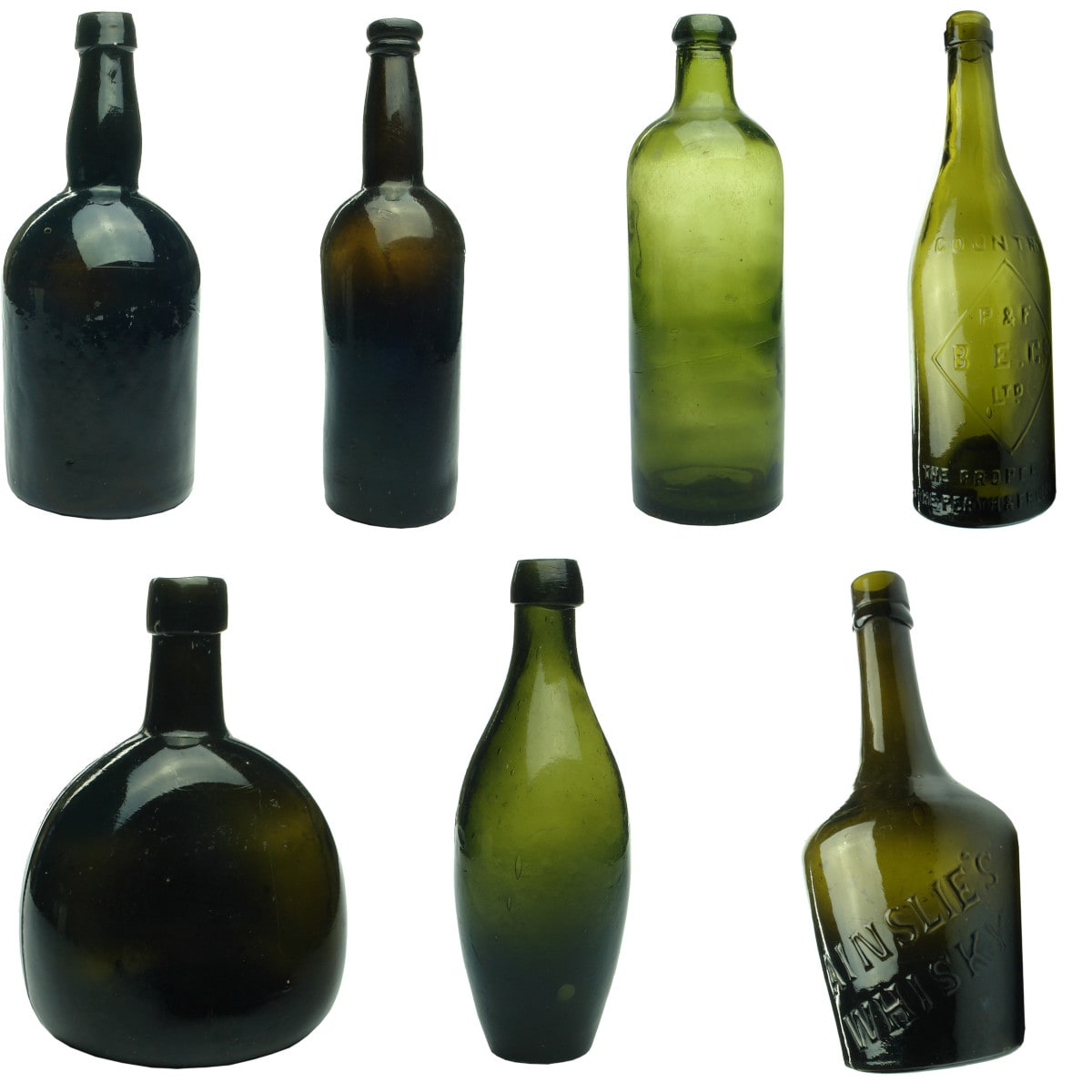 7 Black Glass Bottles. Squat Black; Tall Black With Blobby Lip; Hunyadi Janos; Perth & Fremantle Bottle Exchange Co Ring Seal Beer; Plain Bladder Shaped Wine; Half size skittle; Ainslie's Whisky.