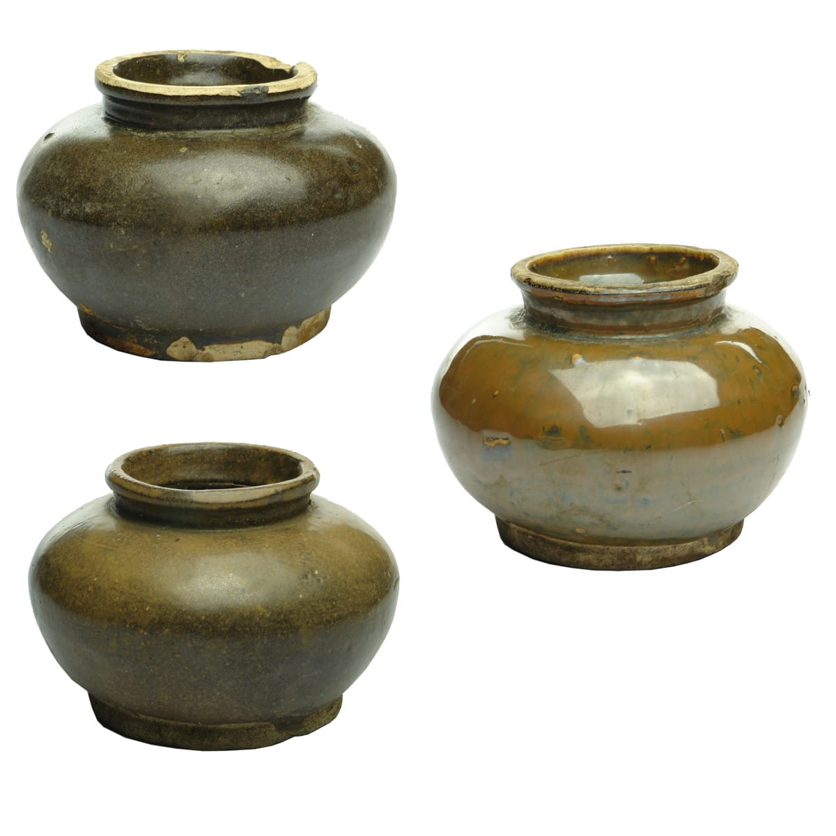 Three Chinese squat bulbous brown glazed jars.
