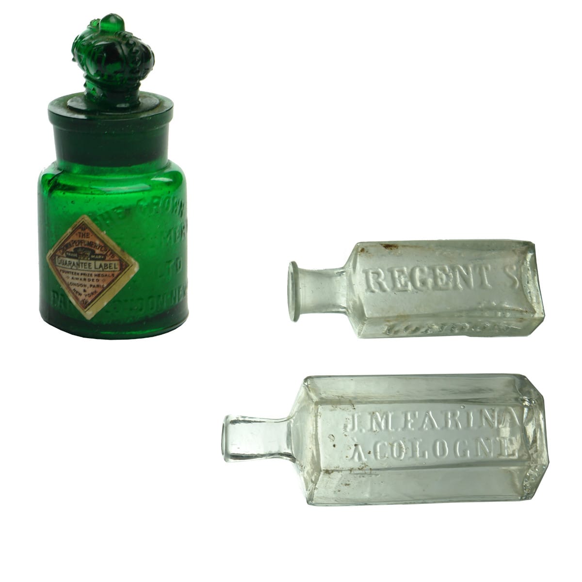3 Perfumes / Smelling Salts. The Crown Perfumery Co Ltd. Original Crown Stopper. Label and Contents. Two pontil scarred bottles: Farina, Cologne and Macassar Oil, Regent St., London.