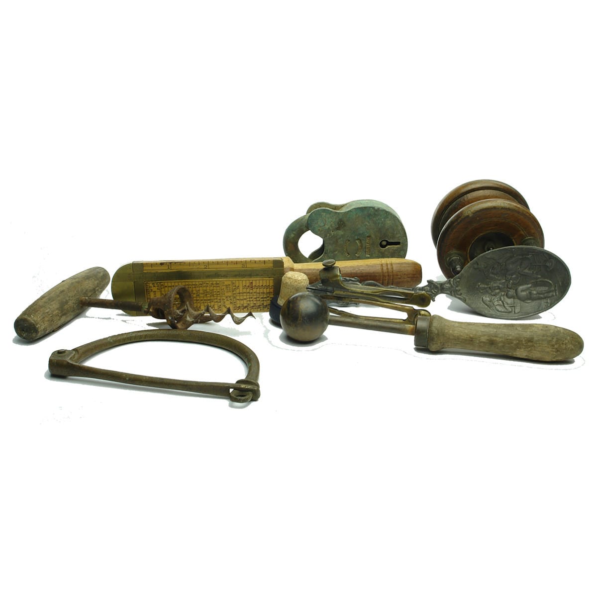 10 Brass/Wood items. Small Bartleets fishing reel; Brass & Wood measuring instruments; 2 small brass compasses; Spoon; Corkscrew; Lock; Other things!