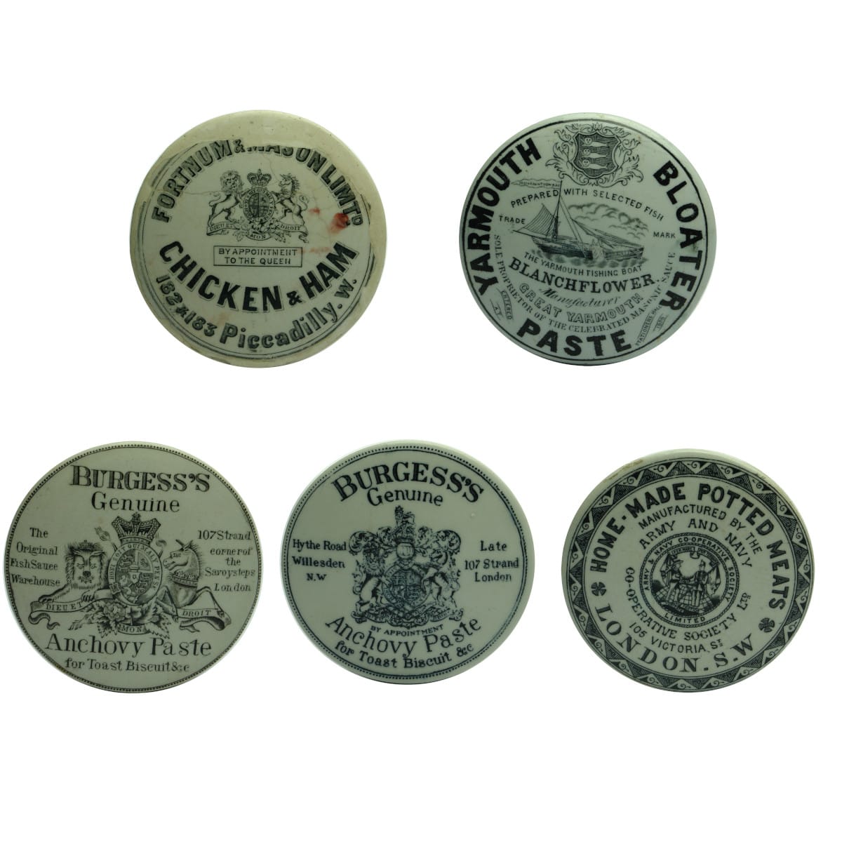 Five Food Paste Pot Lids: Fortnum & Mason; Blanchflower Bloater Paste; 2 different Burgess's Anchovy Paste; Army & Navy Potted Meats.