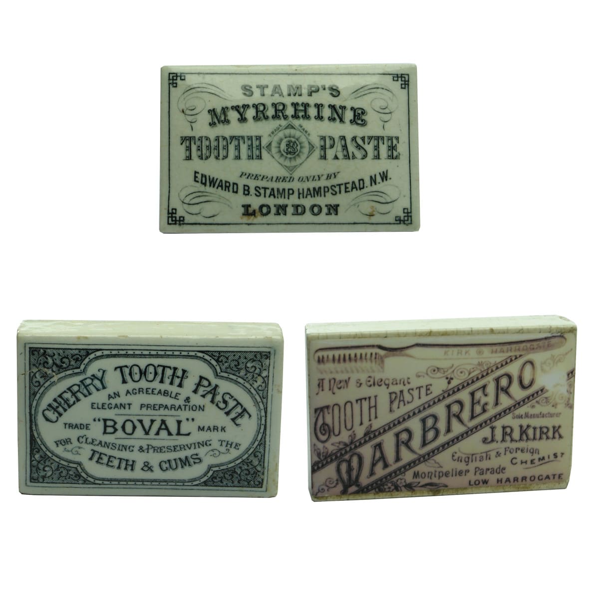 Pair of Rectangular Pot Lids and a base: Stamp's Myrrhine Tooth Paste; Boval Cherry Tooth Paste; Base has a modern printed paper sticker for Marbrero Tooth Paste.