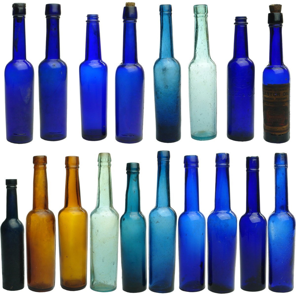 18 Castor Oils! 5 oz and 1 x 2.5 oz. 14 Blue; 2 Aqua; 2 Amber. George Whybrow blue stopper.