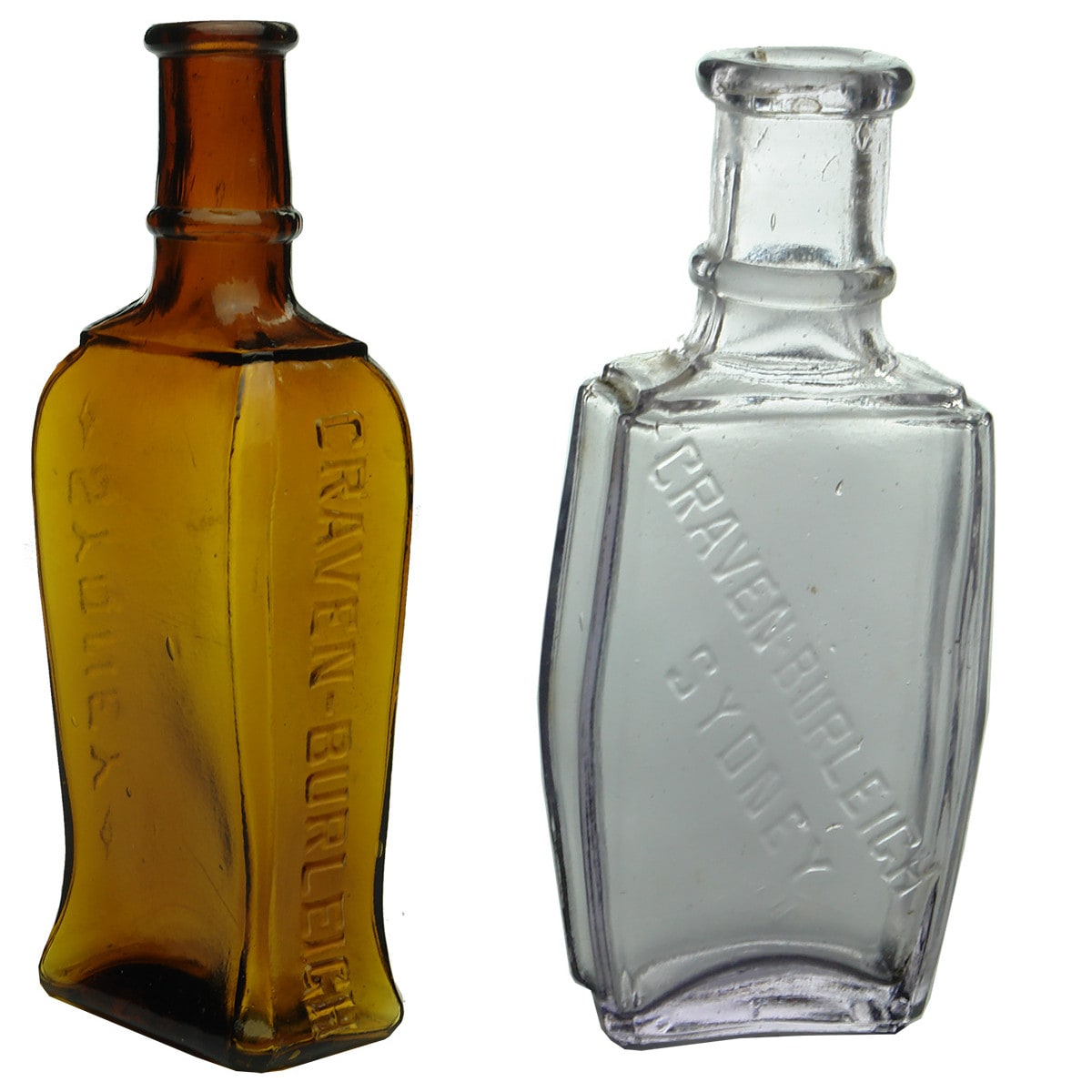 Pair of Hair Bottles: Craven-Burleigh, Sydney. Amber and Amethyst. 6 & 2 oz. (New South Wales)