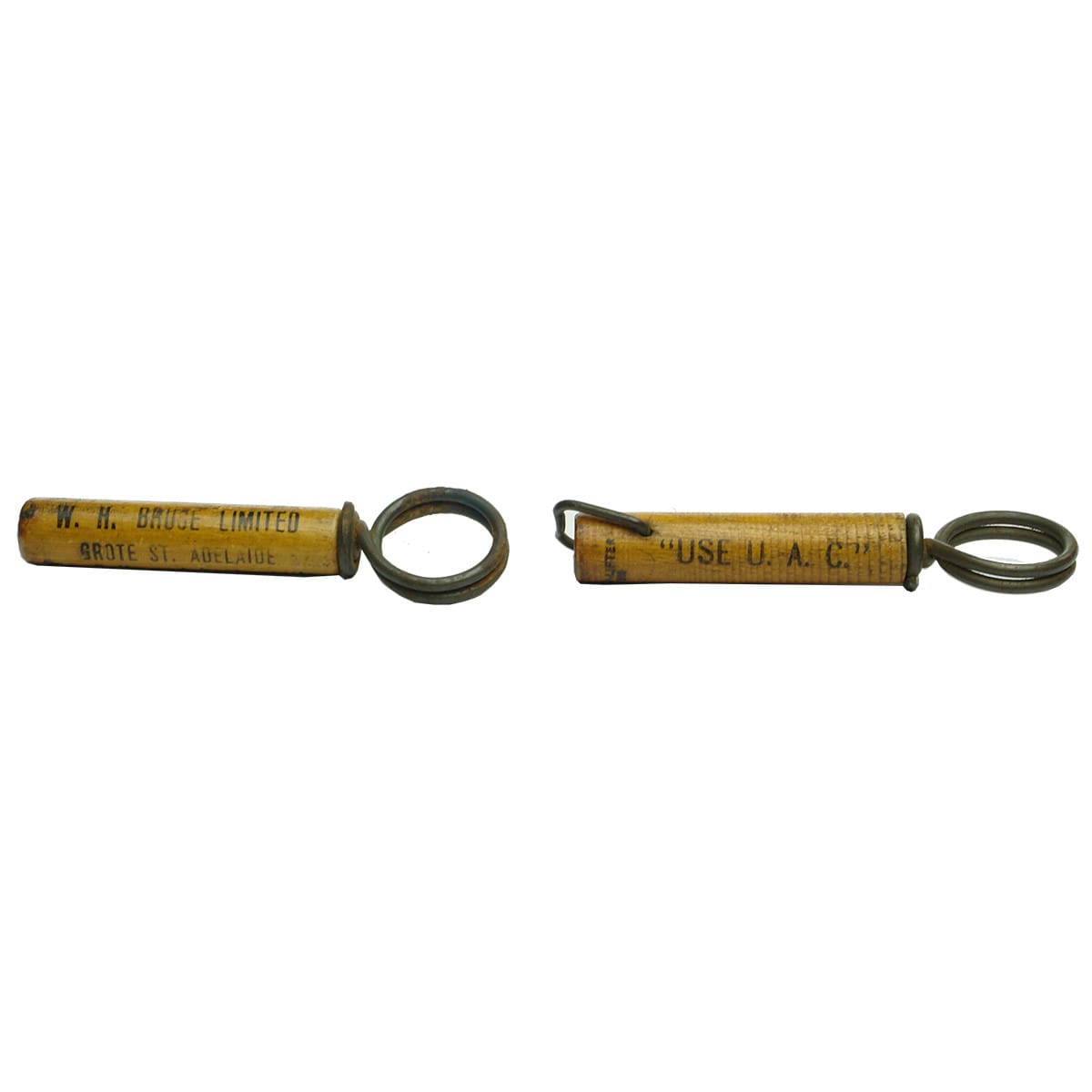Two promotional corkscrews with wooden covers: W. H. Bruce Ltd, Adelaide and Use U. A. C. Upton's Ammonia Cleaner.
