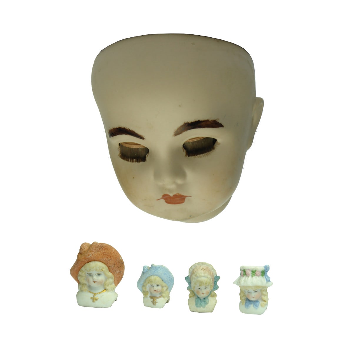 5 Dolls Heads. 4 x Unusual Bonnet Doll's Heads and 1 Large Bisque Doll's Head.