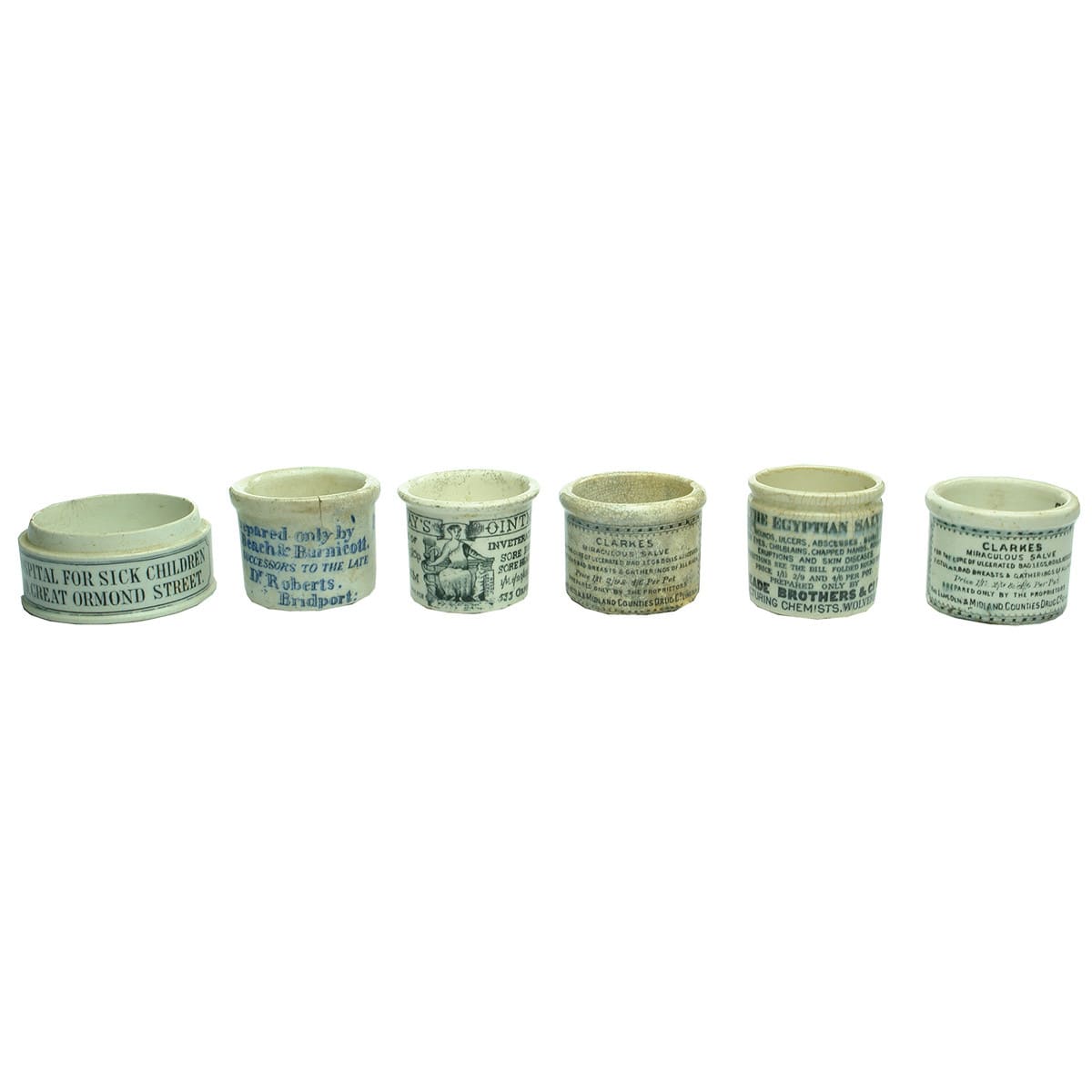 Six Ointment pots: 2 x Clarke's Miraculous Salve; Poor Mans Friend; Egyptian Salve; Holloways Ointment and base from Hospital for Sick Children.