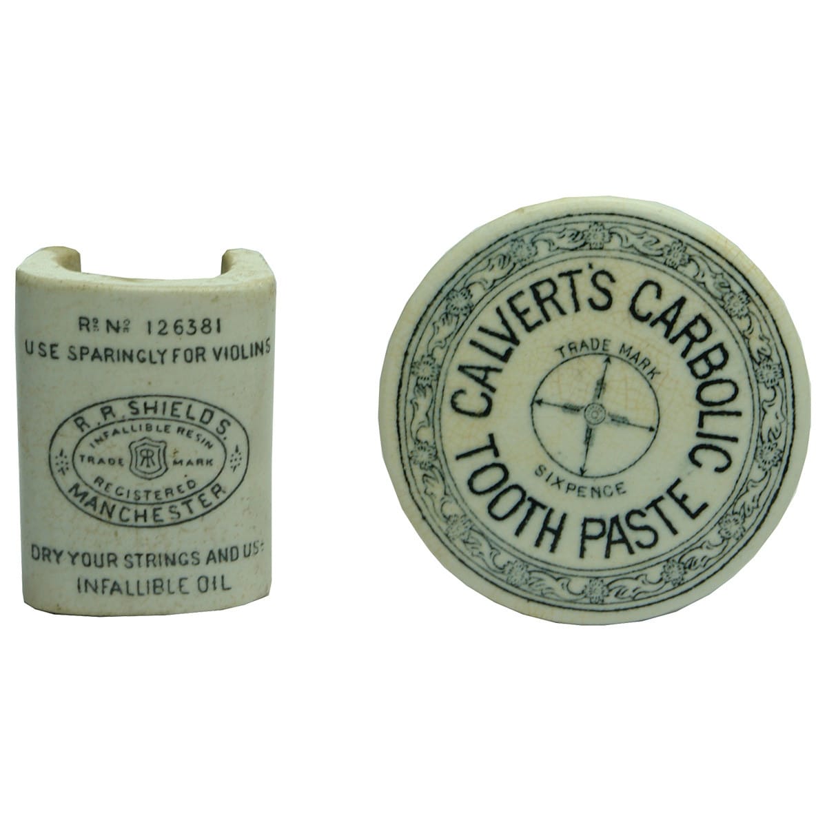 Pair of Pot Lid type items: Calvert's Carbolic Tooth Paste and Shields Violin String resin holder.