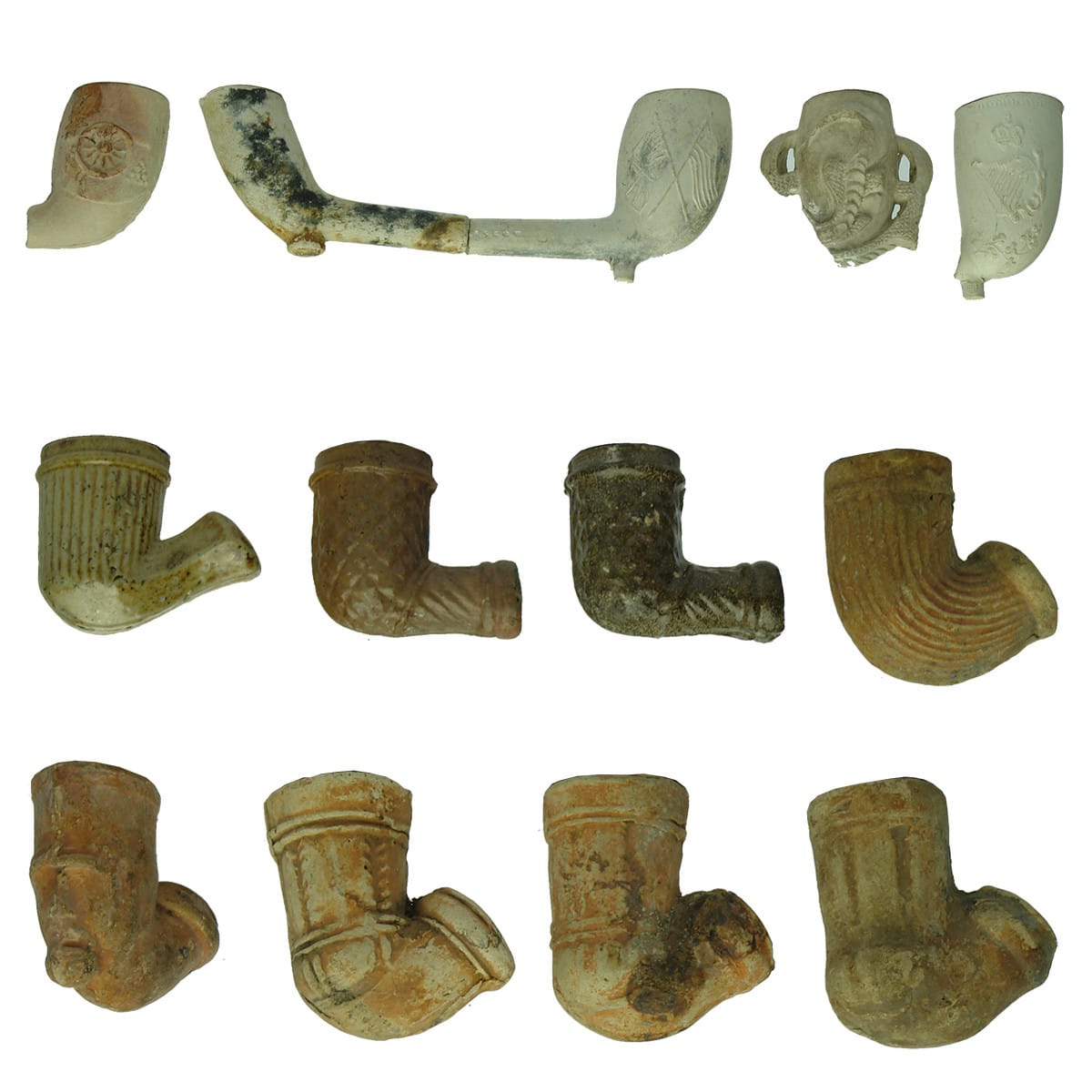 13 Clay Pipes. 5 Damaged, 4 complete pipe bowls and 4 complete terracotta type pipe bowls.
