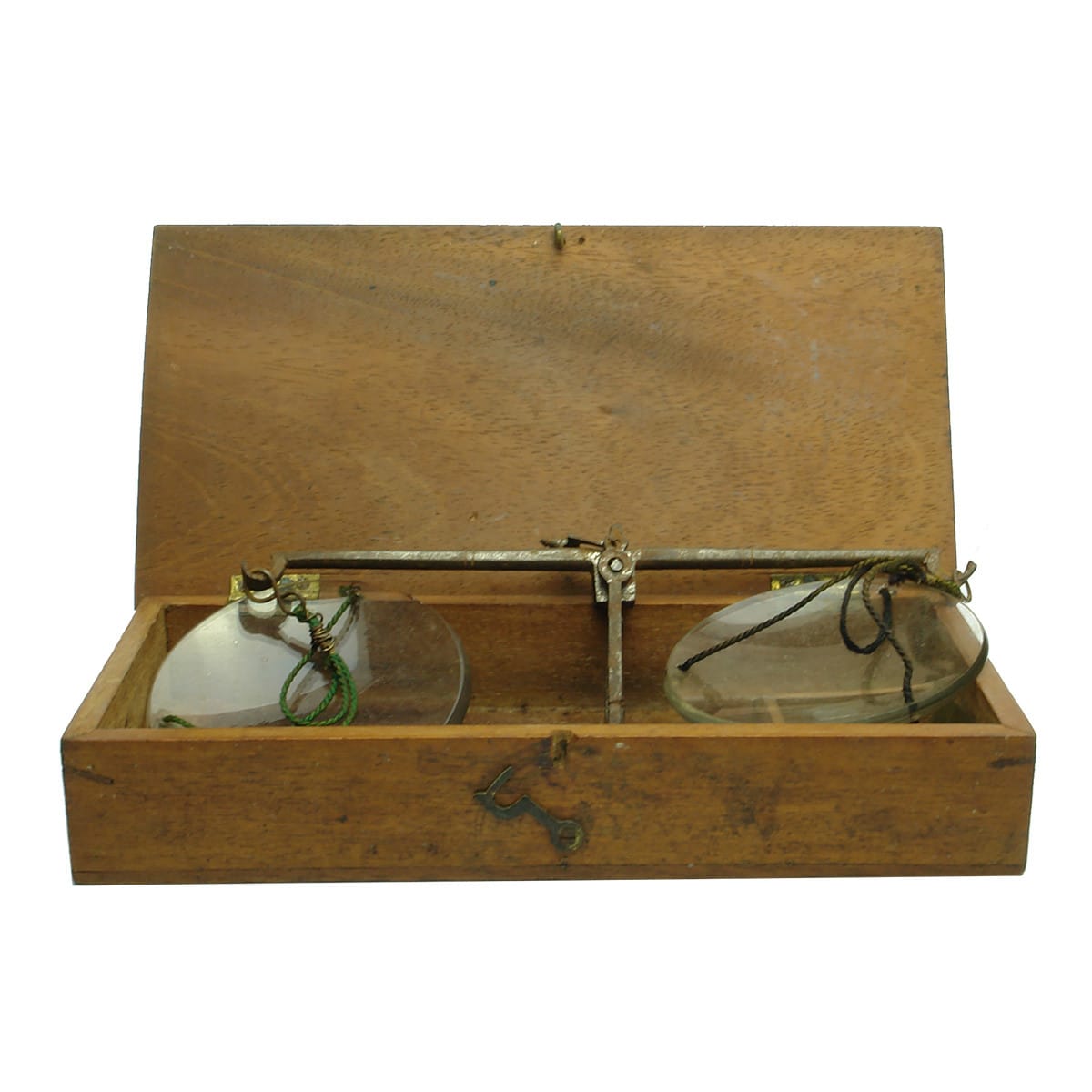 Wooden boxed hand scales set. Brass metal work and glass scale pans. Some brass and lead weights.